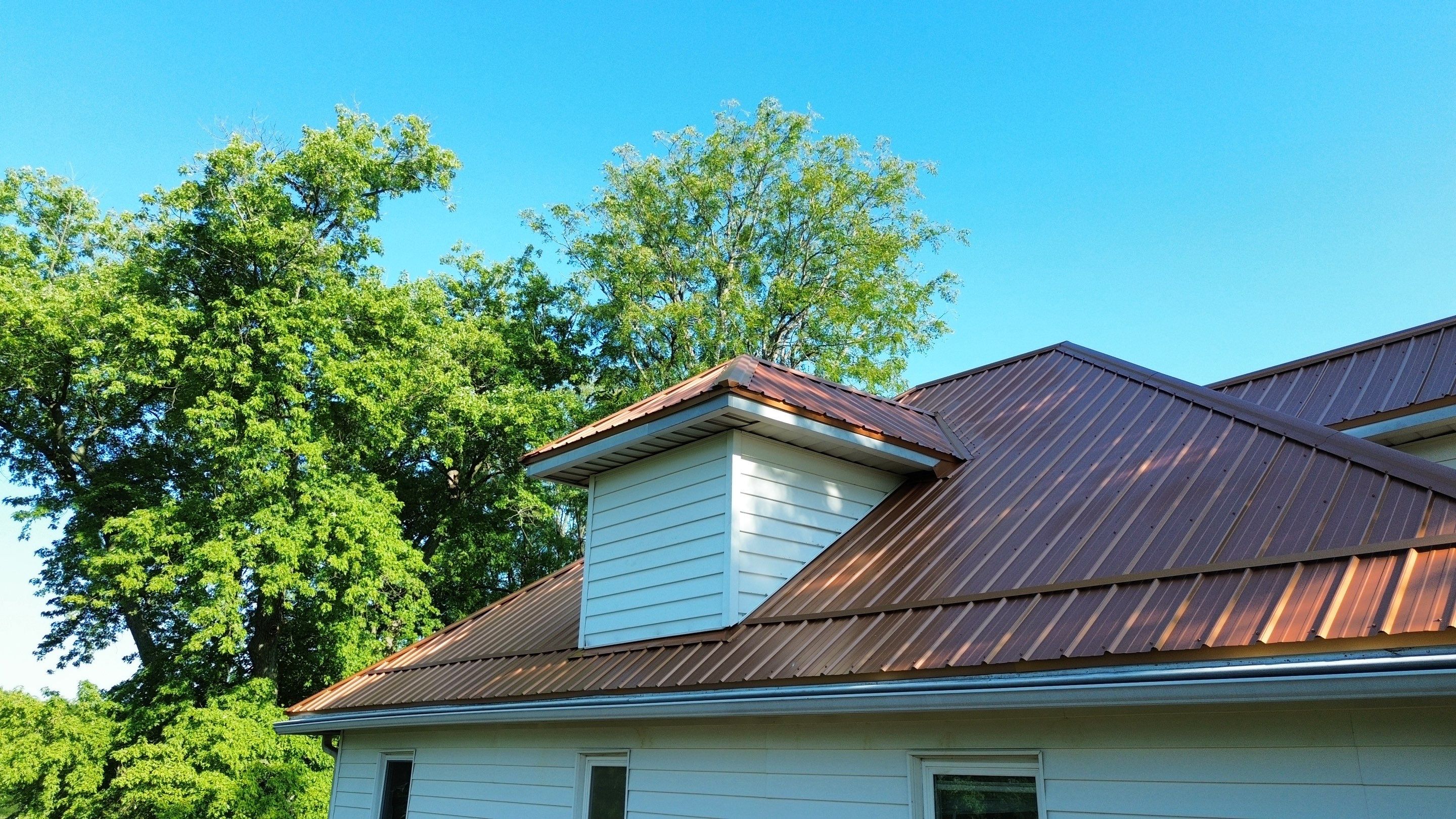 Residential Roofing Installation using Performance Panel Metal - Copper Metallic by RoofX 