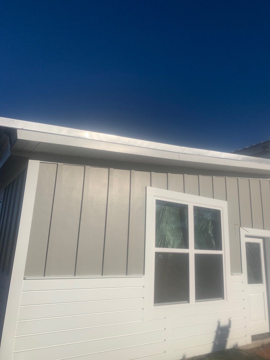 Soffit and Fascia on a metal building by Gutter Professors