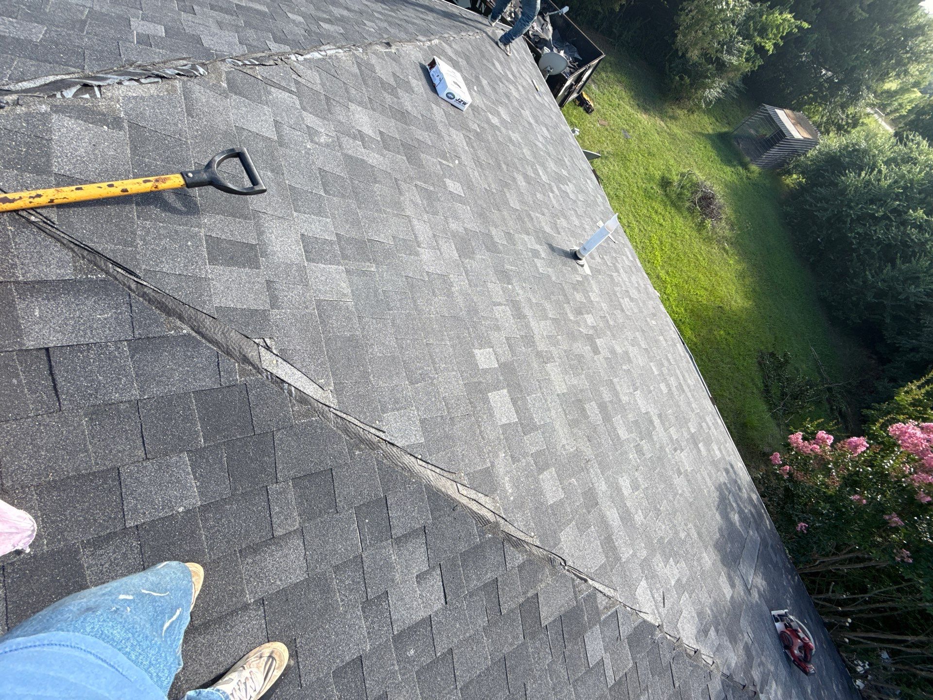 2 layers tear off & installation of new architectural shingles. by In & Out Construction & Remodeling, LLC