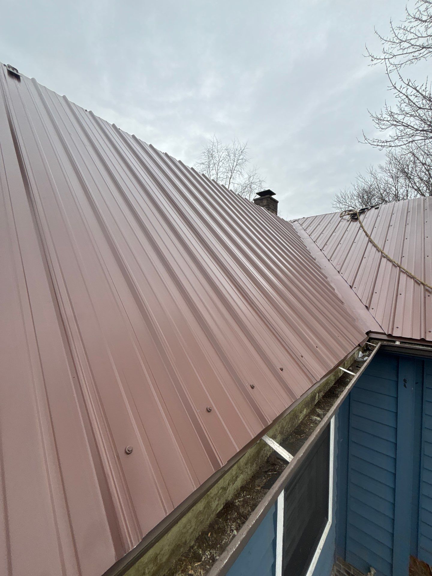 Residential Roofing Installation using Metal by Rainstoppers Roofing