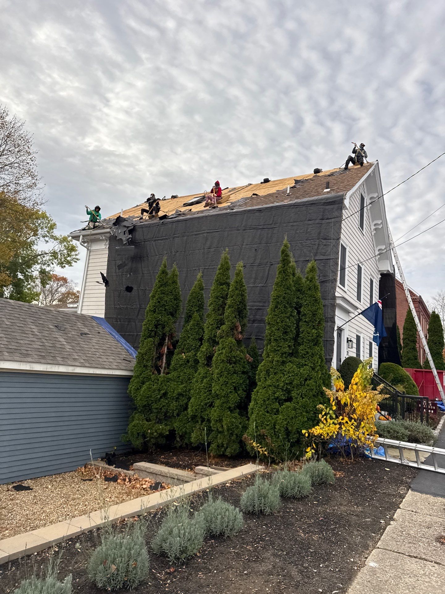 Newburyport Complete Roof Replacement with Solar Venting Skylight by Mighty Dog Roofing of Greater Middlesex County