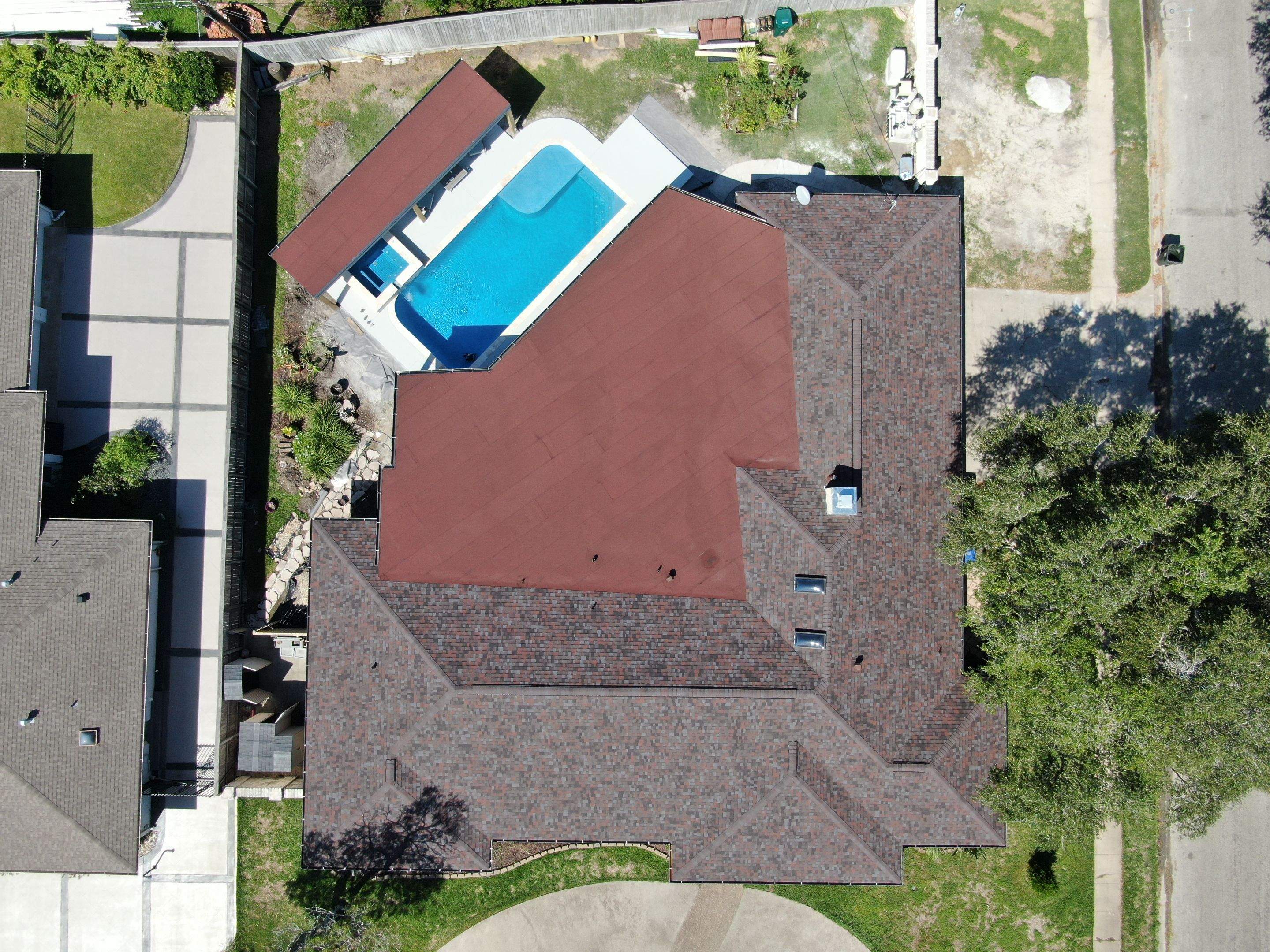 Beautiful pool side build by Bayfront Roofing and Construction