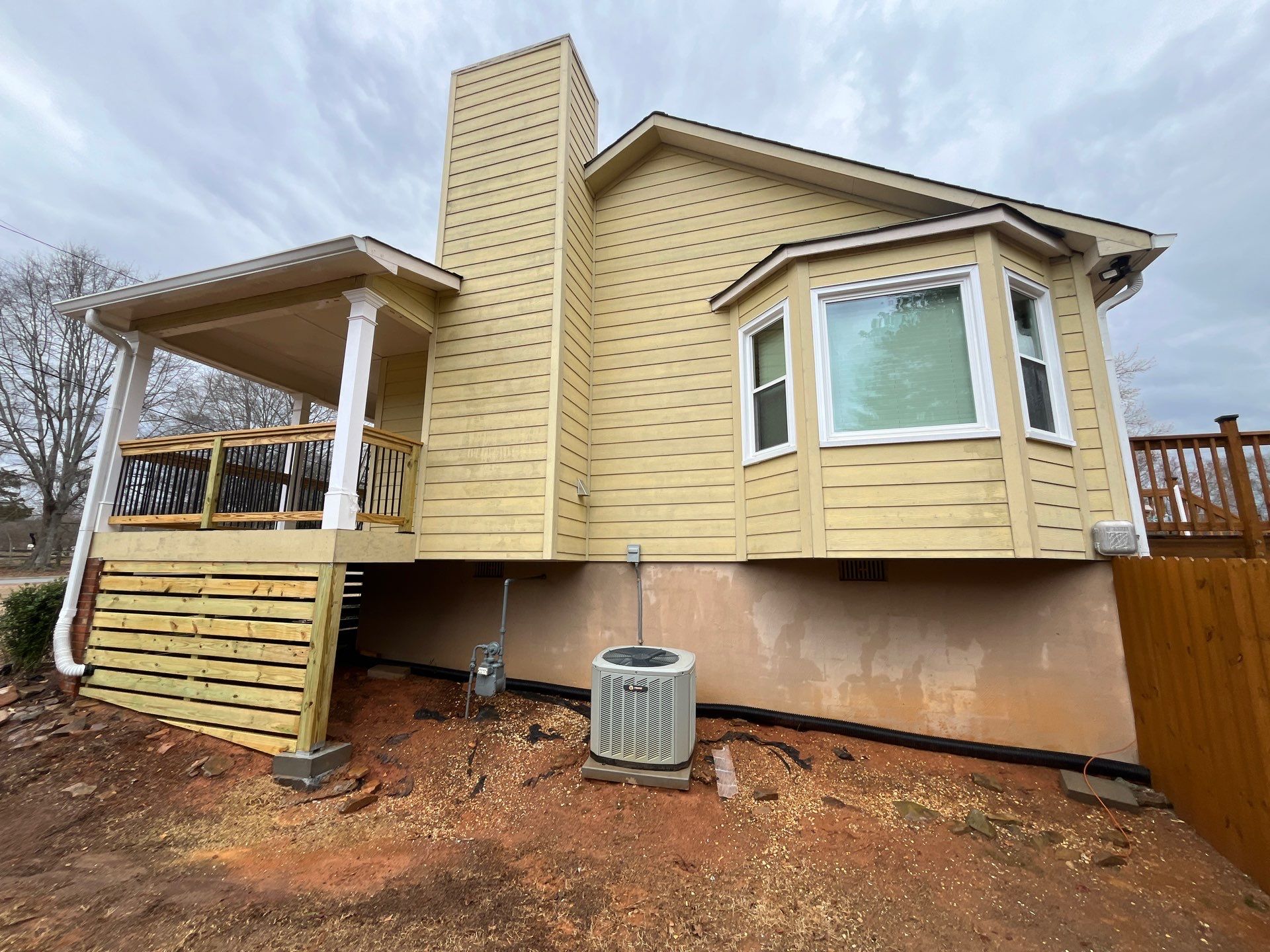 Acworth, GA James Hardie Board and Batten Siding Installation, Porch Renovation, Exterior Painting, and Window Replacement by Nelson Exteriors 