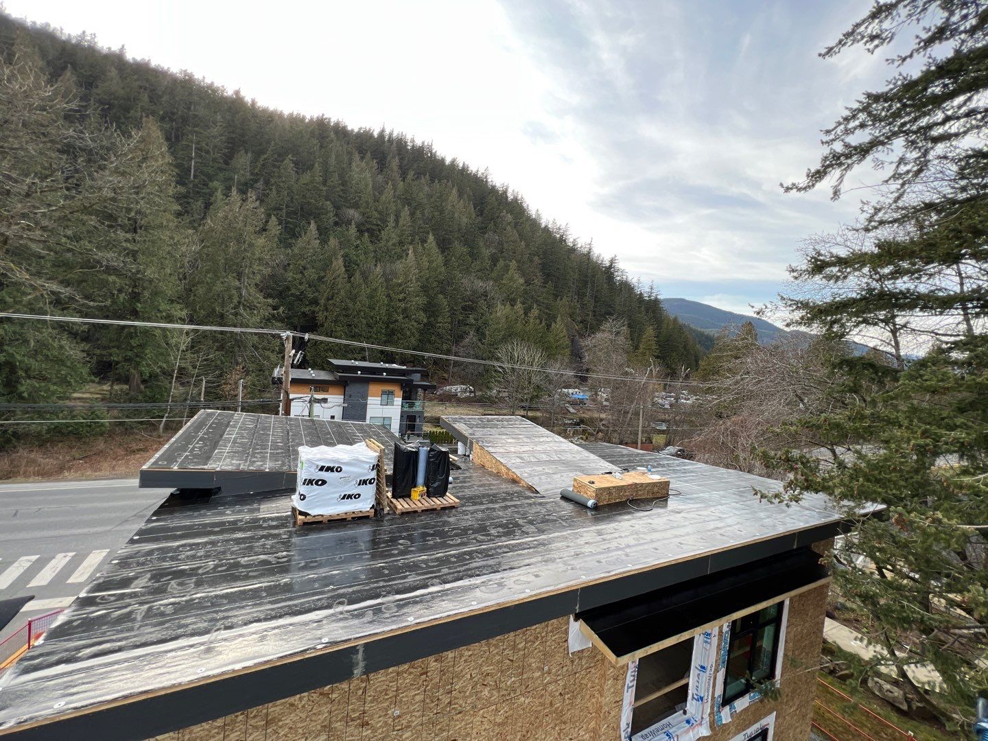 Commercial Roofing Installation using IKO 2ply sbs  by Top Notch Roofing Inc