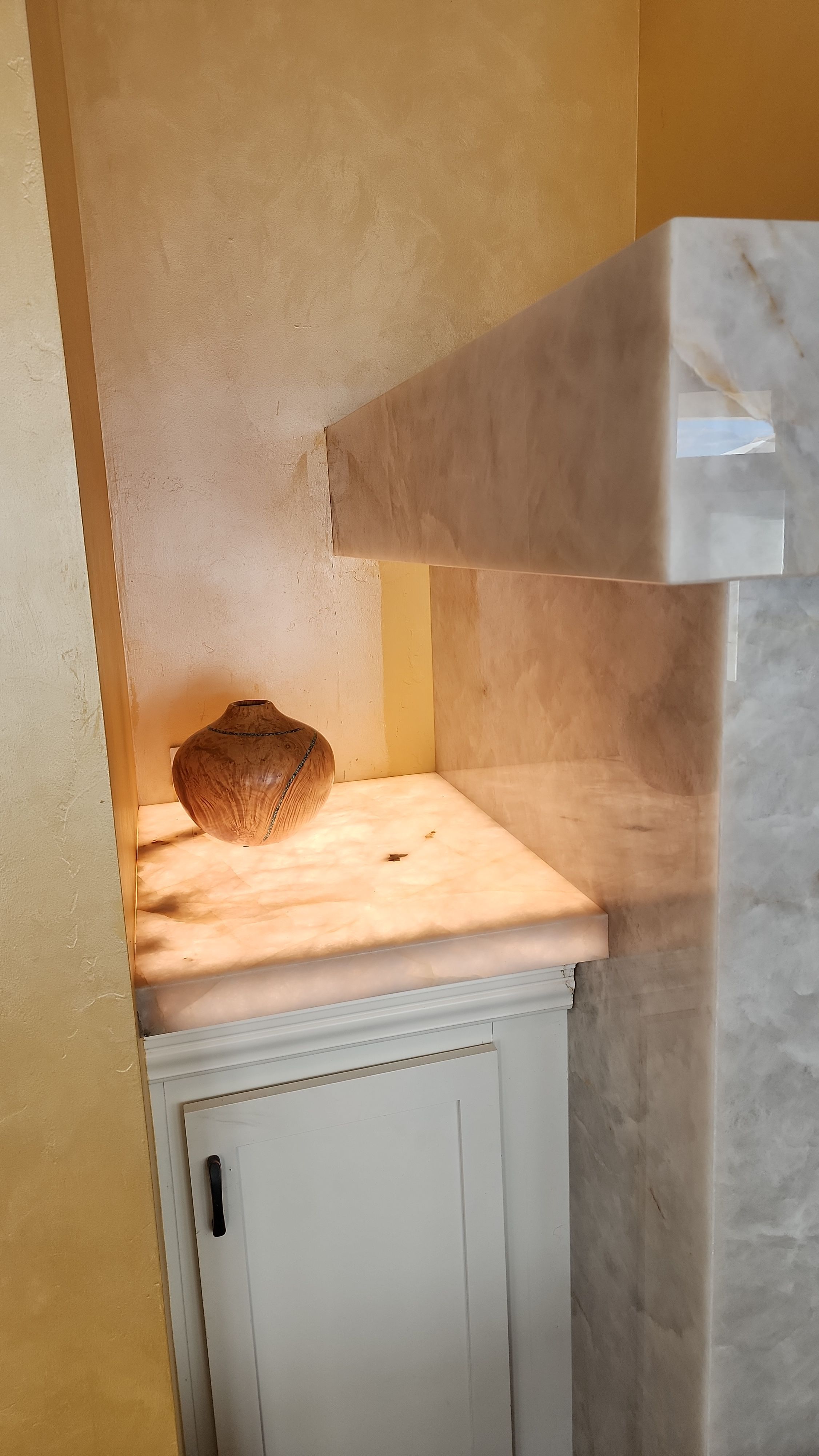 Backlit Stone On A Fireplace by S.Y. Electric Inc.