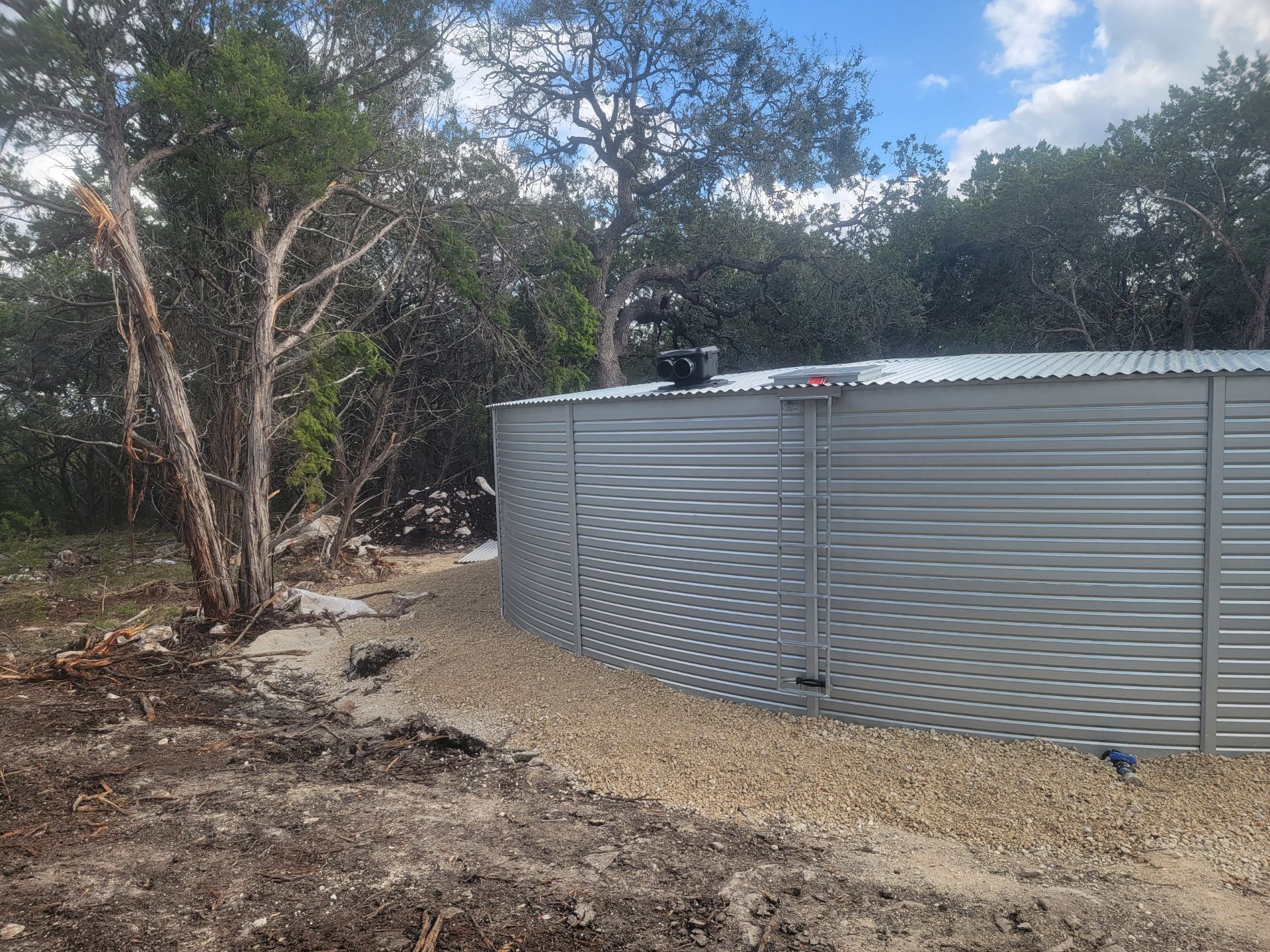 Major Addition using 52000 gallon Pioneer (XLR 40/2 ZN) in silver by Hill Country Rain Water