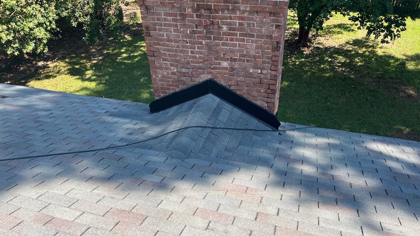 Chimney and Pipe Boot Flashing Roof Repair by Midlands Roofing & Exteriors