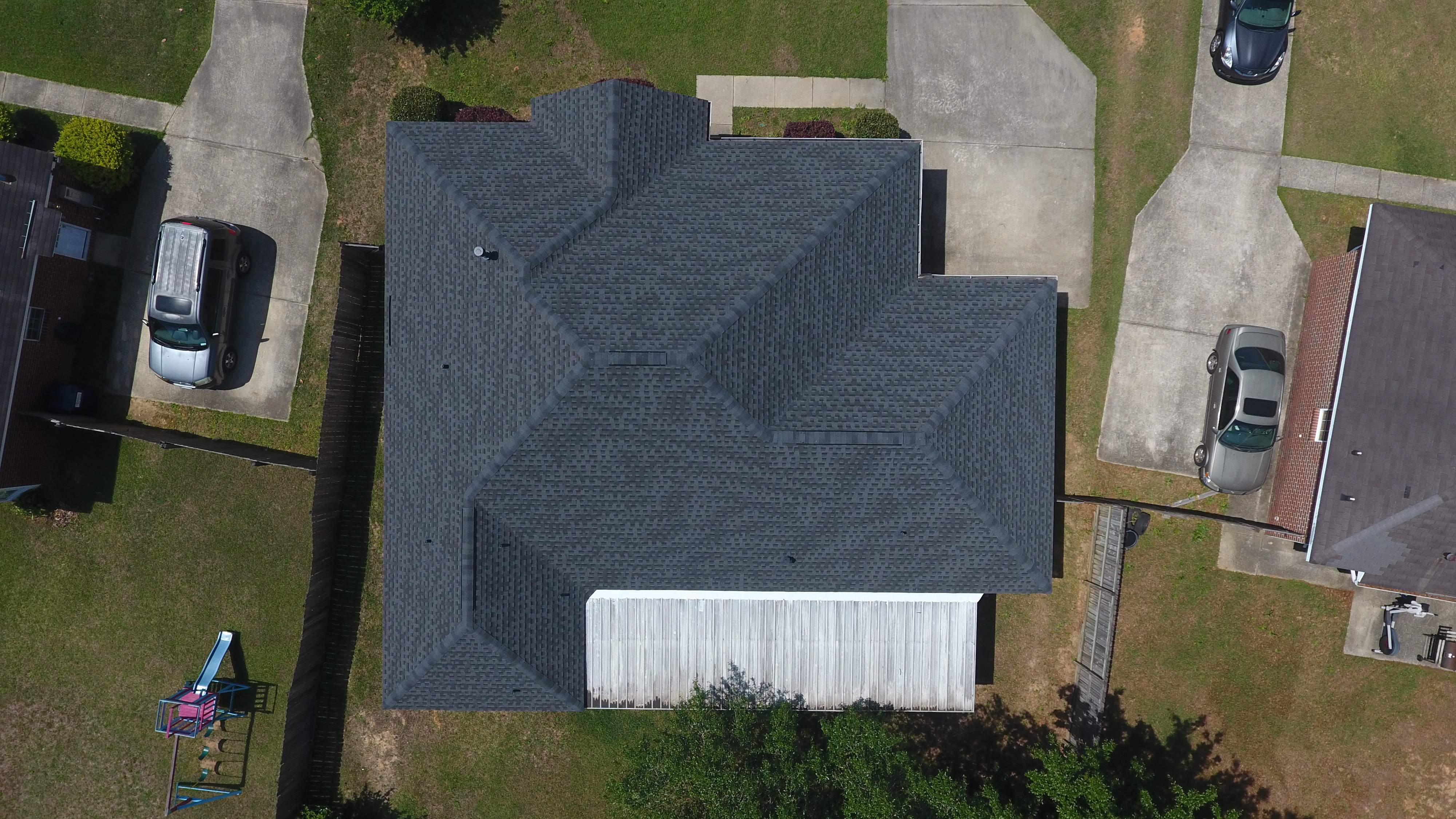 Residential Roofing Installation using Roof Replacement by American Roofing & Construction LLC