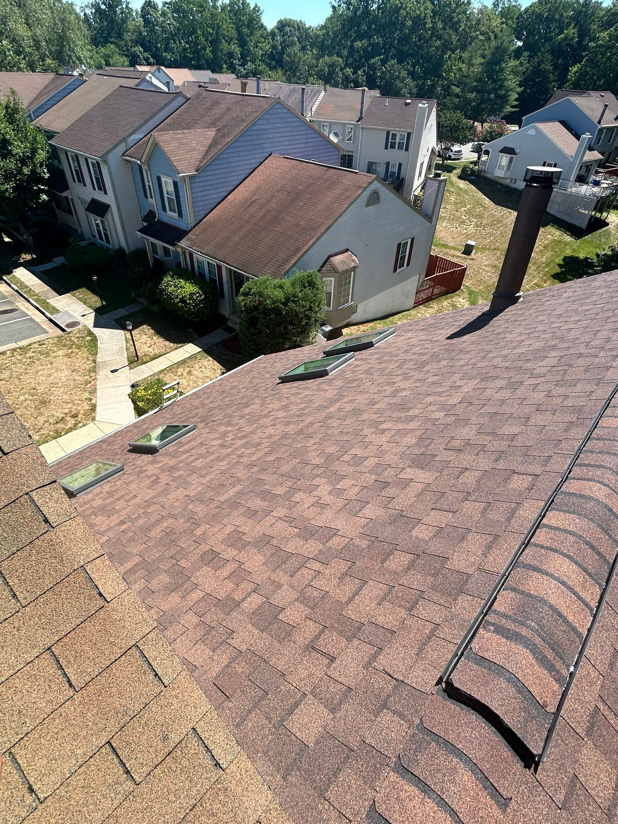 Montclair: Roof Installation with CertainTeed Landmark Designer Shingles in Burnt Sienna by RM Banning, Inc.