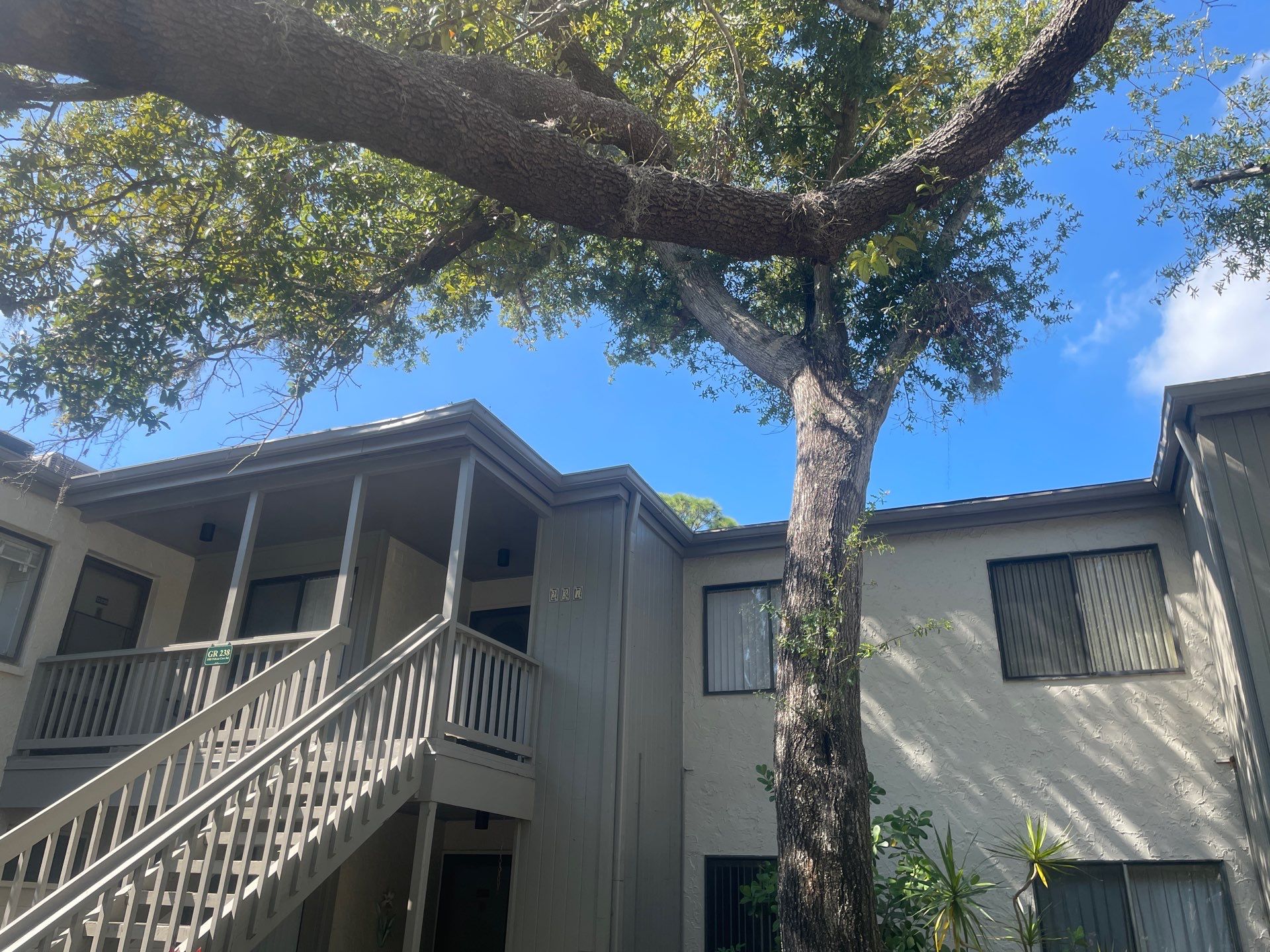 White Gutters Repair and Installation in Sarasota FL by Gutter Professors