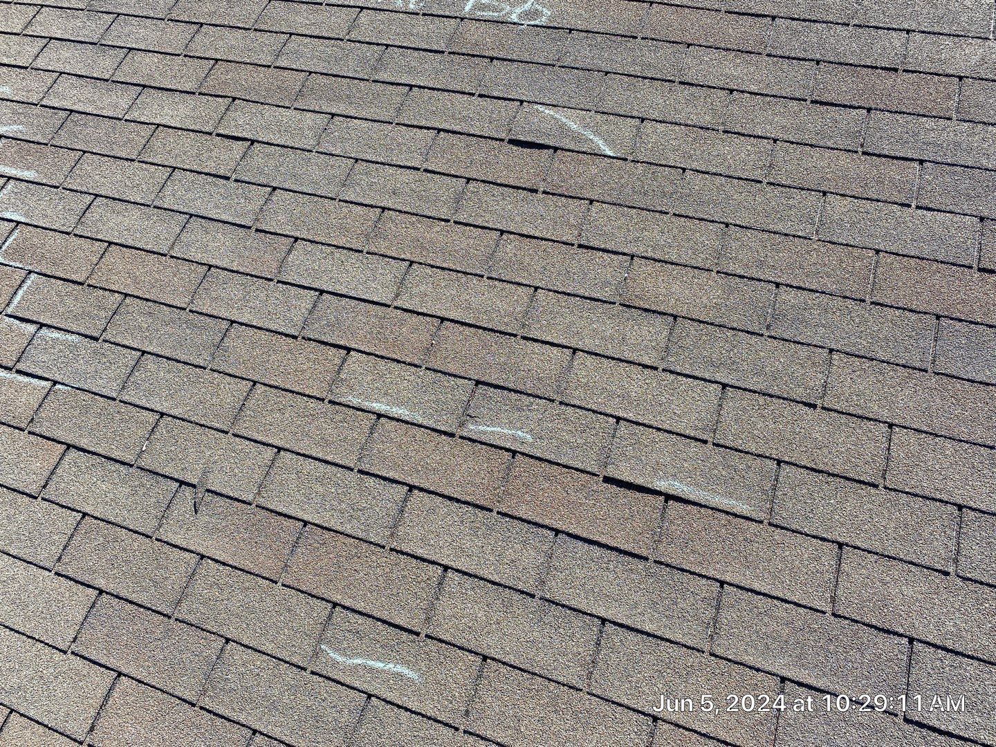 Roof inspection in Bartlesville by Decor Roofing & Restoration