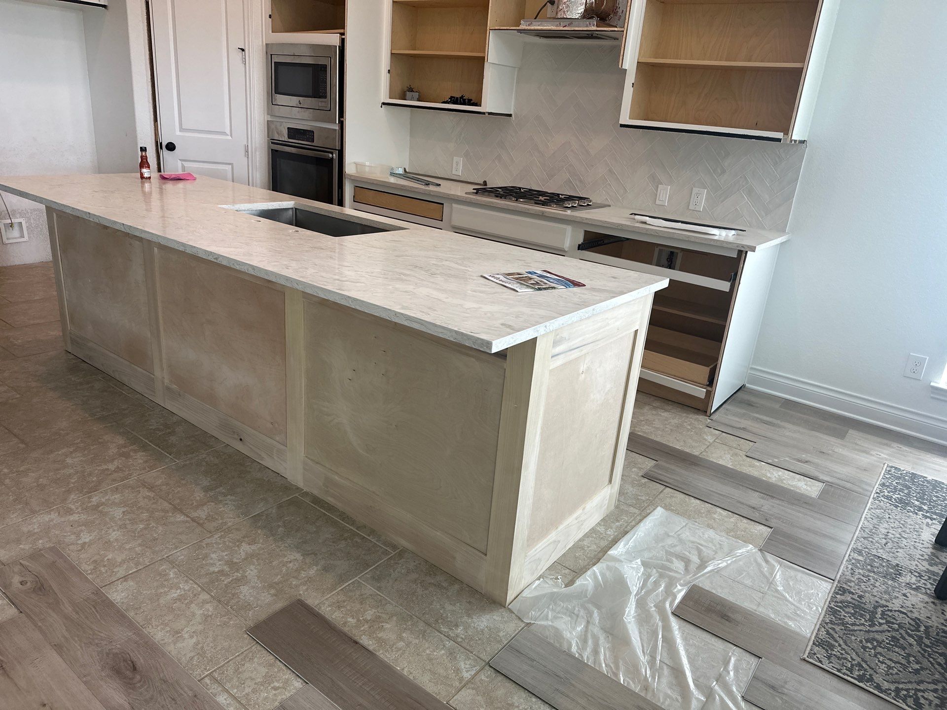 Kitchen Remodel using Water mitigation equipment by L&T General Contractors and Restoration INC