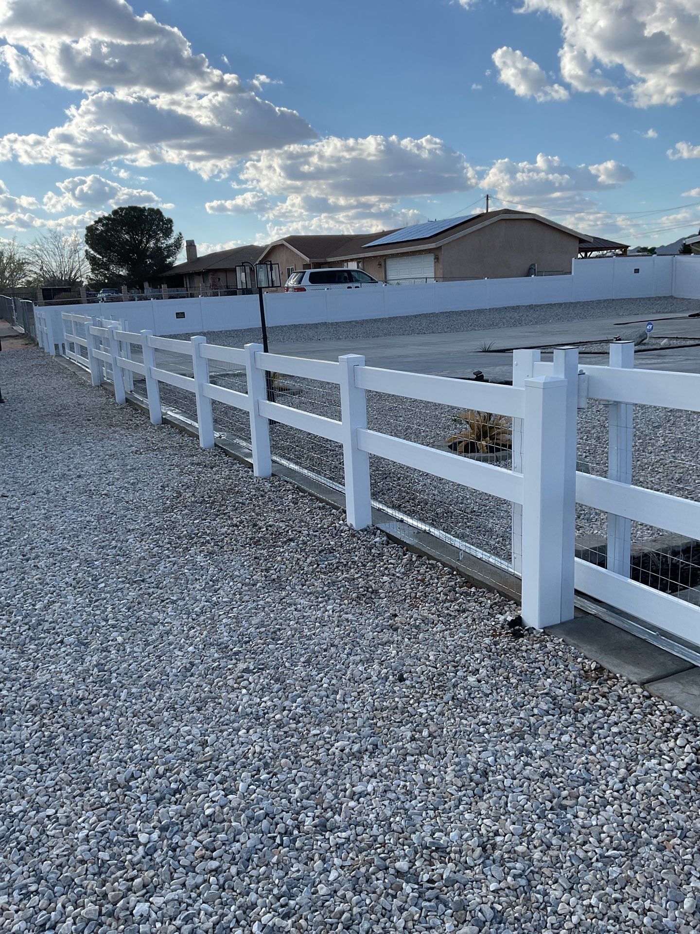 Wrought Iron Frame Ranch Style Sliding Gates by Fence Guys Inc.