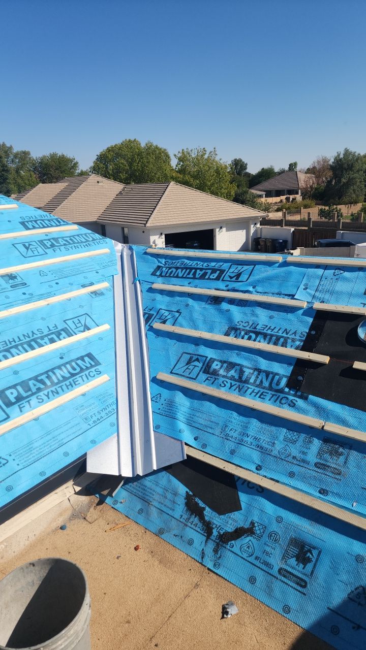 Gray Tile by Reimagine Roofing