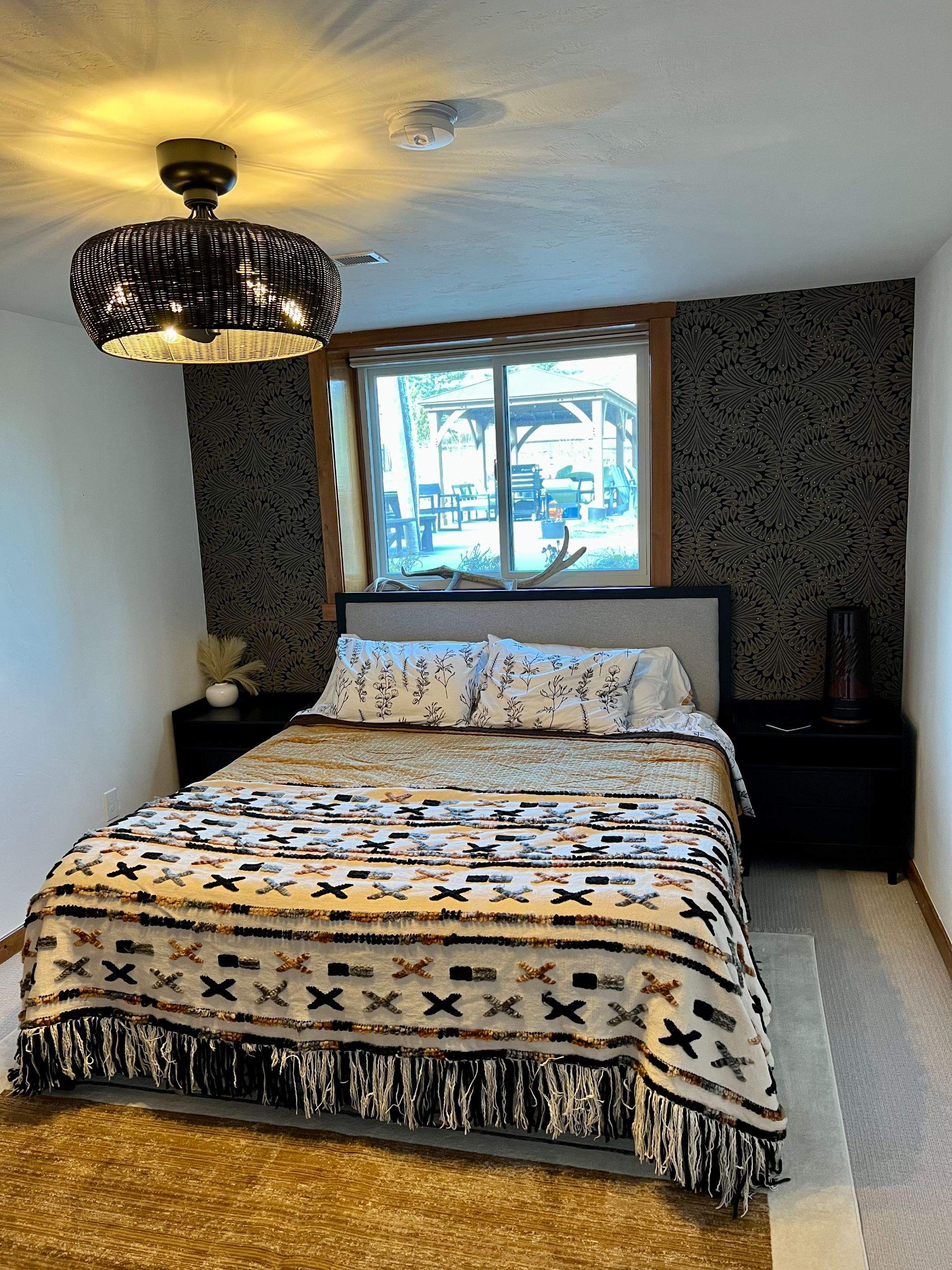 Bedroom Remodel using wallpaper by Gold Peak Property Management