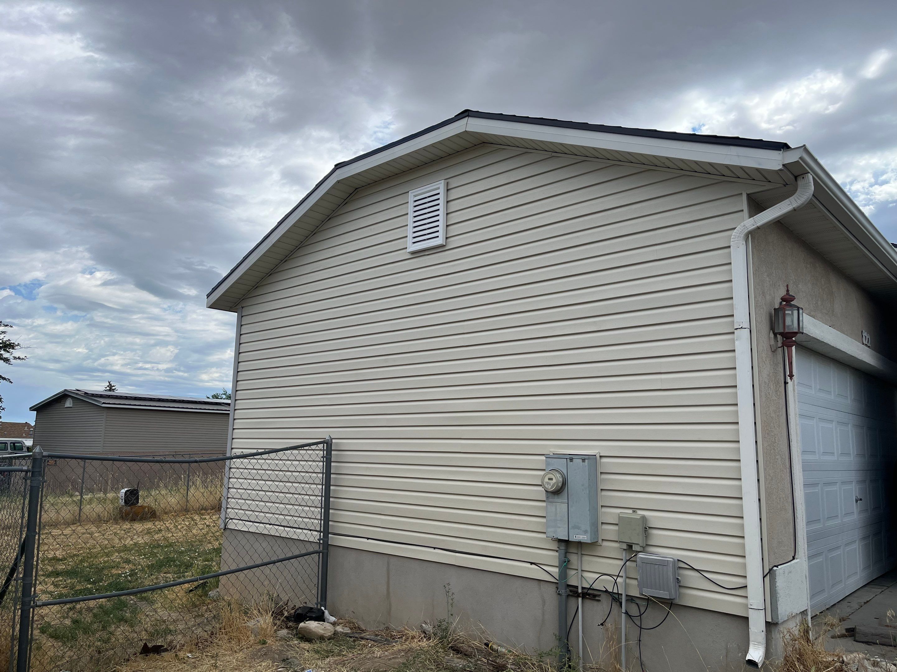 Tooele | Precision Vinyl Siding Repair | Almond by Ideal Siding Utah
