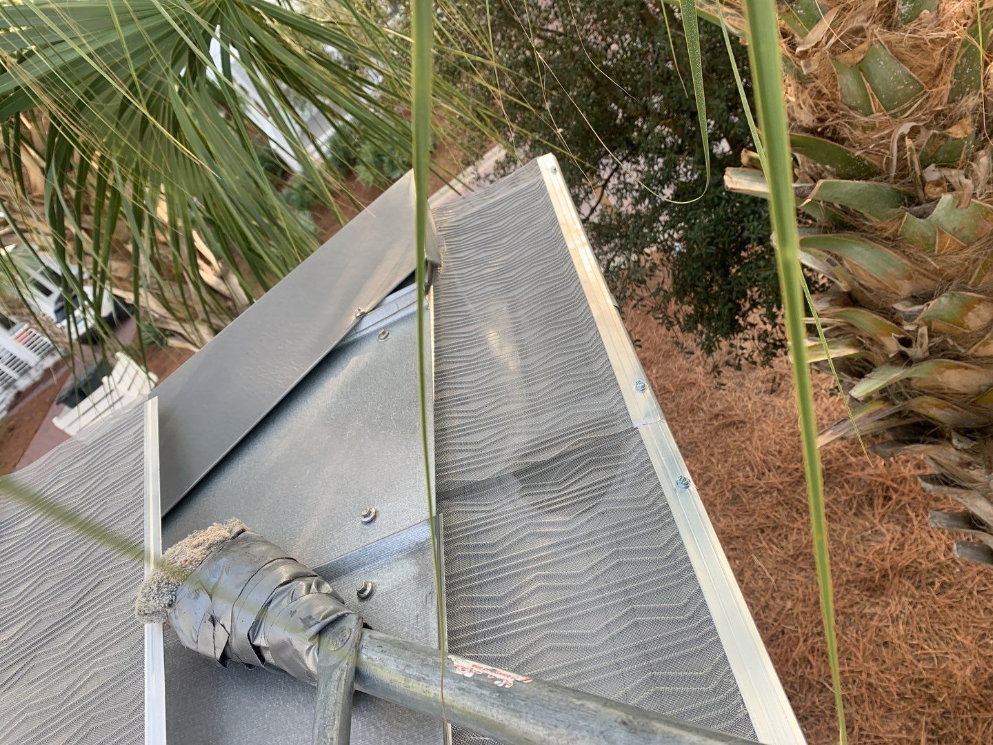 Gutter Installation using Galvalume Half Round Seamless Gutters and LeafBlaster Pro Gutter Guards by Gutter Professors