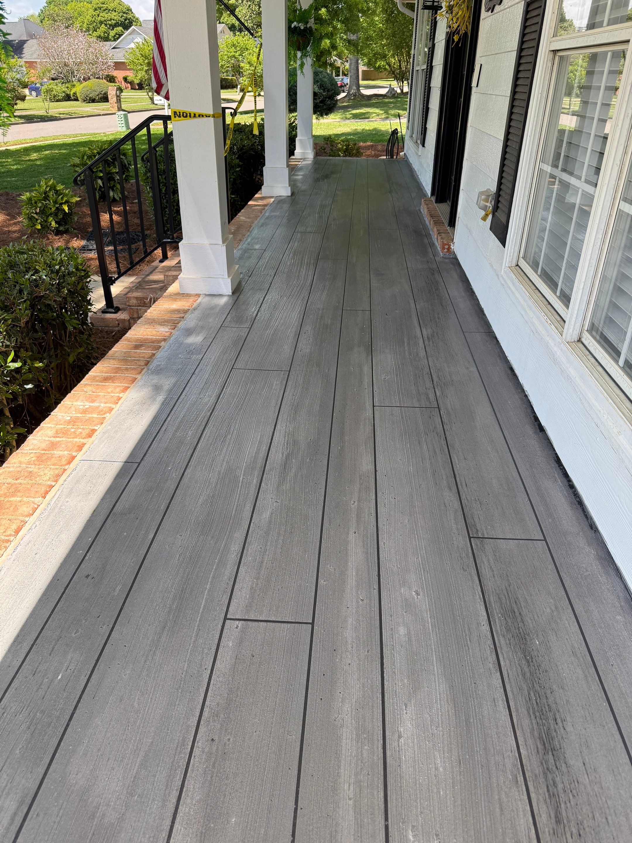 Wood-Grain Stenciled Concrete Porch Resurfacing in Mobile by Cornerstone Hard Surface Restoration 