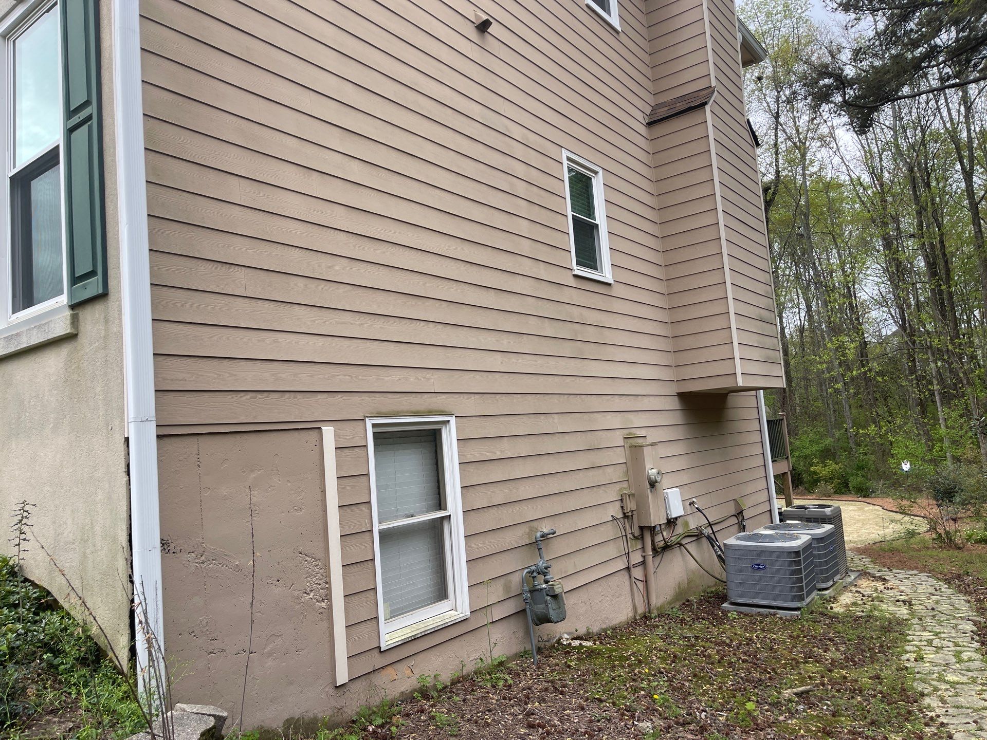 Exterior Painting using Sherwin-Williams and Rotted Wood Replacement by Nelson Exteriors 