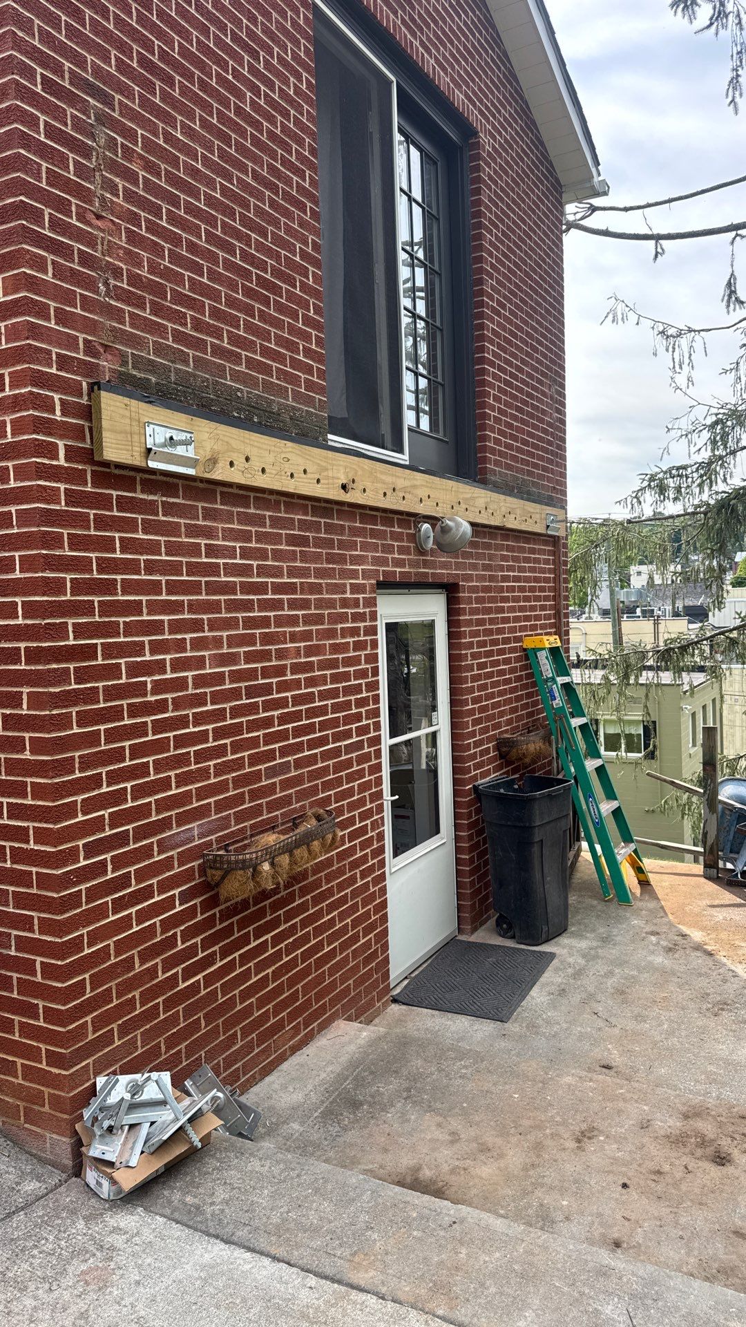 Elevated Composite Deck Rebuild with Black Metal Railing in Lewisburg by Walnut Hollow Decks & Outdoor Living