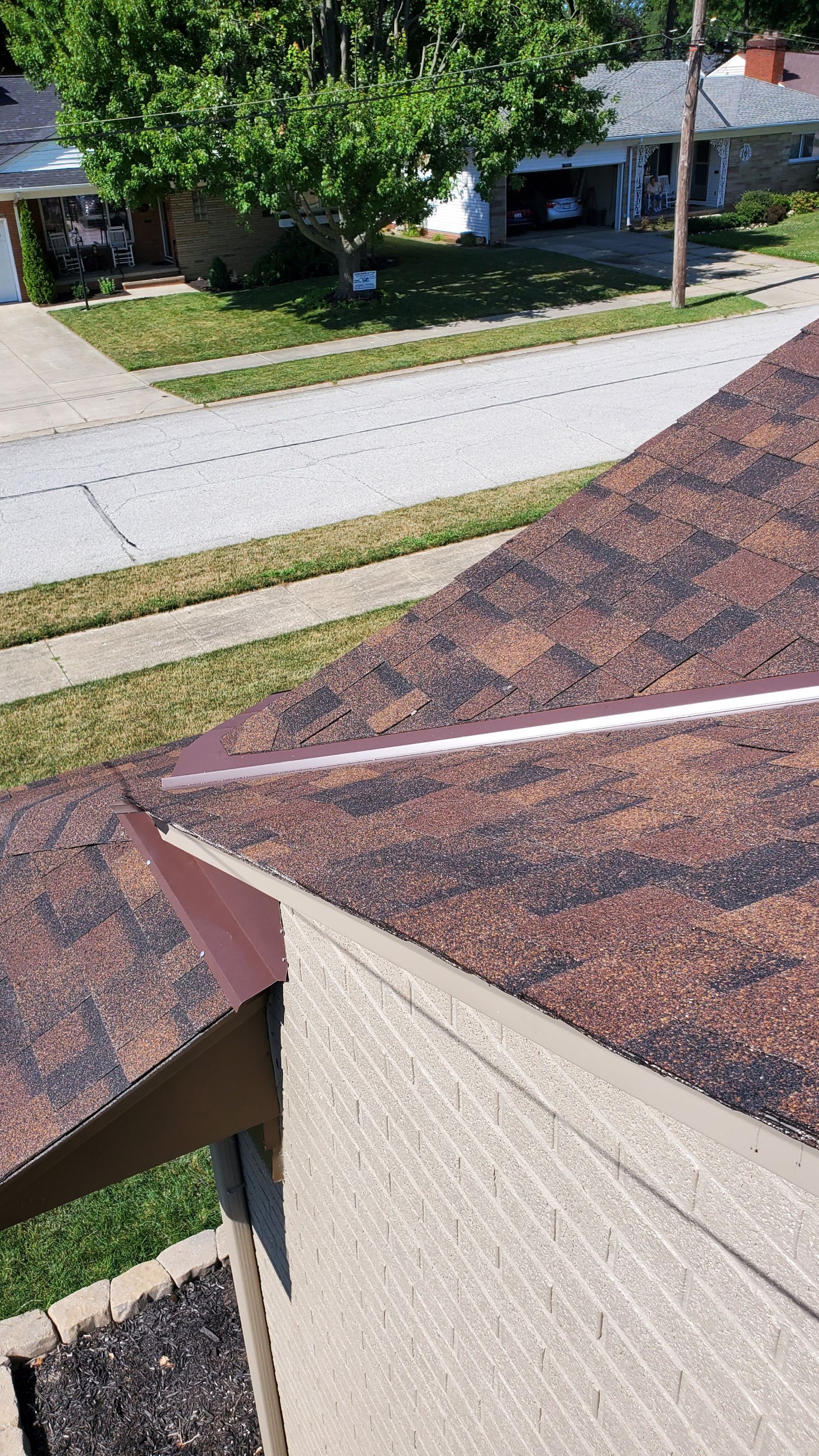 Residential Roofing Installation using Ownens Corning Duration Brownwood by Absolute Roofing and Construction