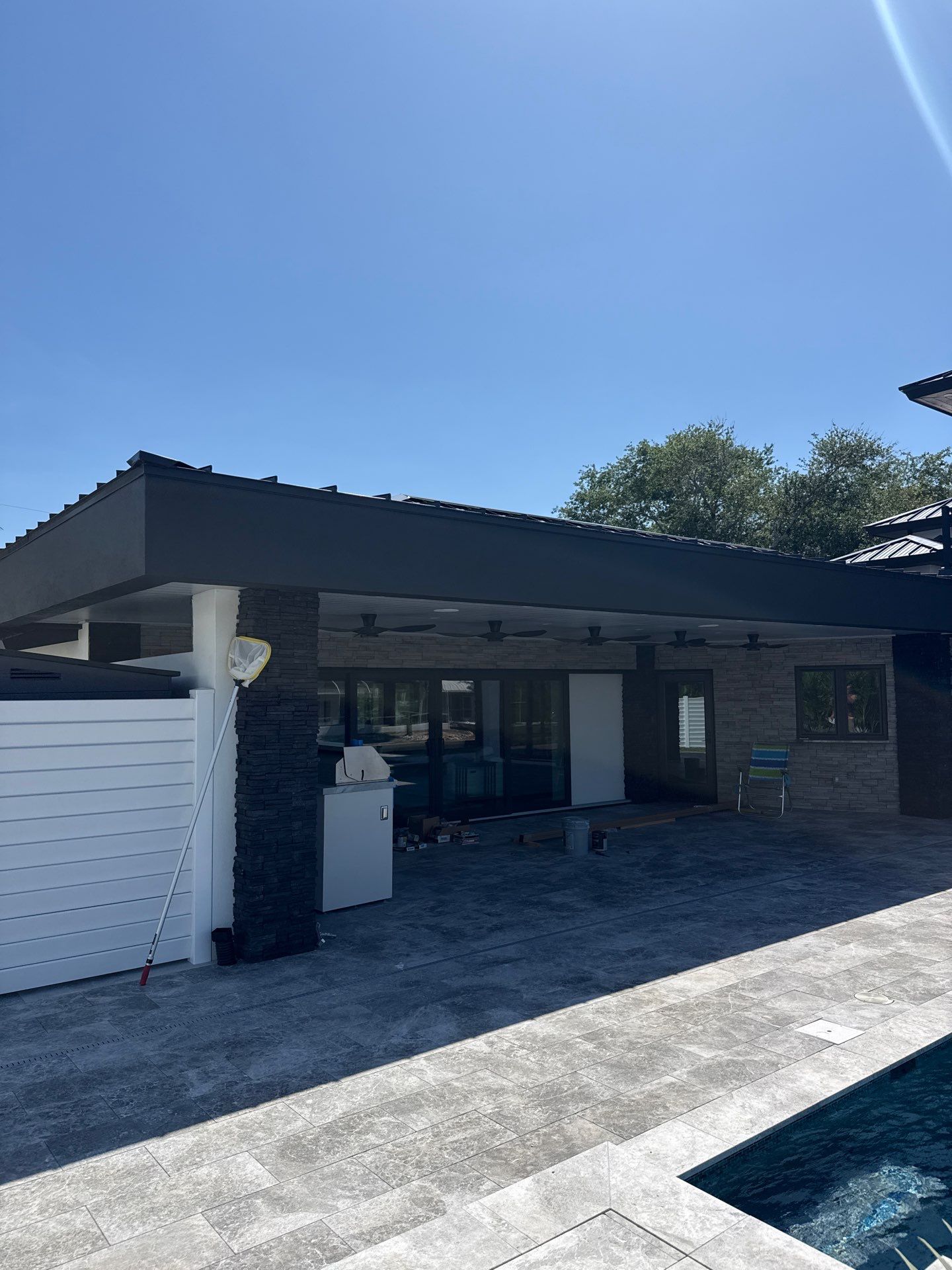 7-Inch Smooth Box Seamless Gutters using black seamless gutters in Siesta Key Fl by Gutter Professors