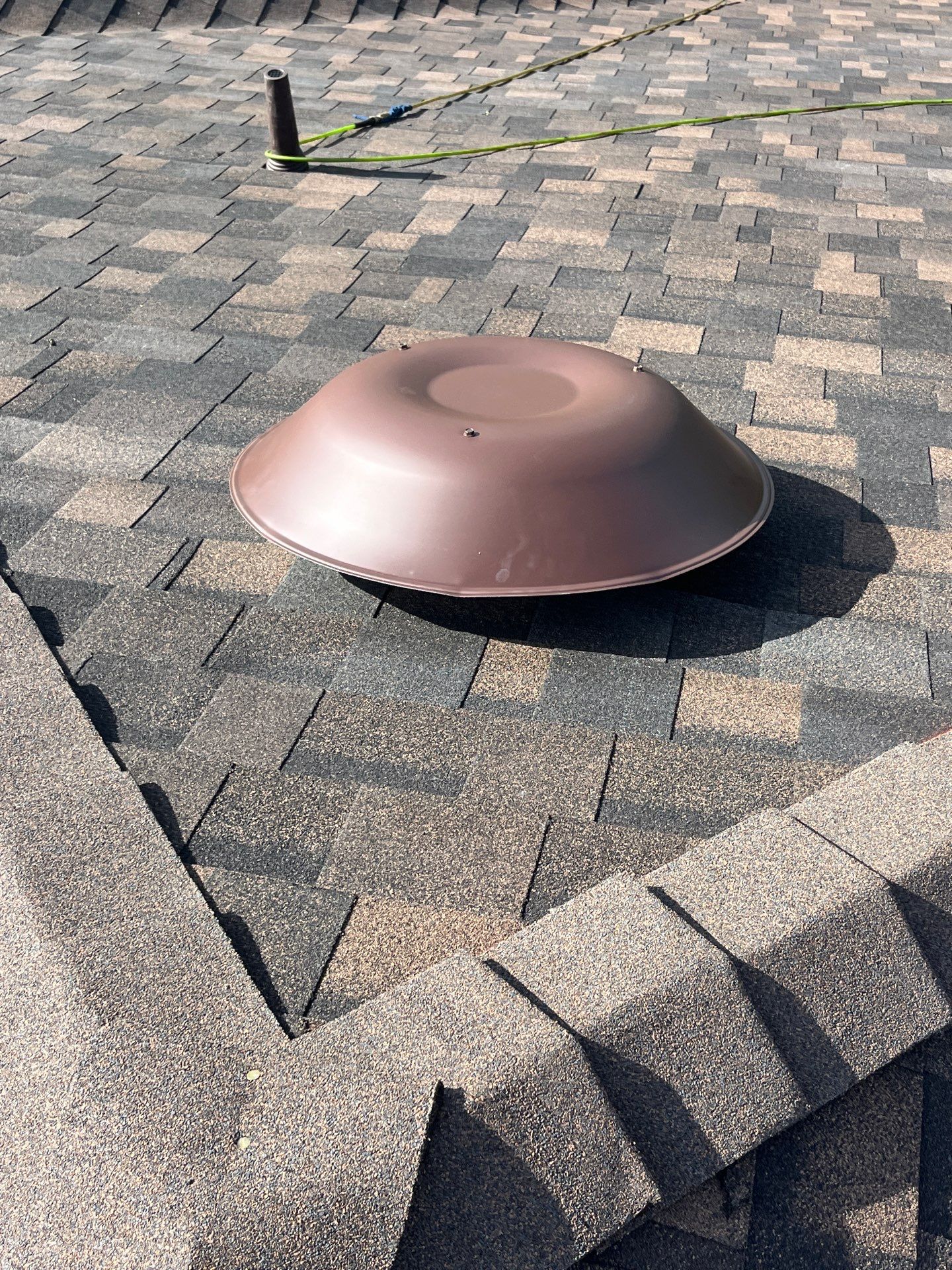 IKO Shadow Brown-Medium brown brick house by Tejas Roofworks + Restoration