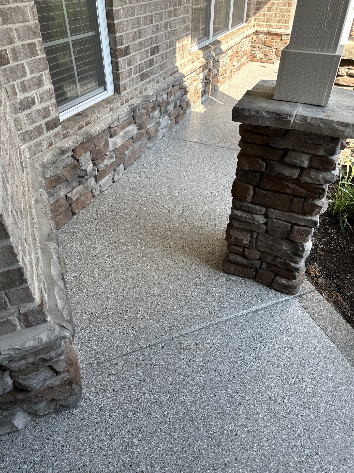 Driveway Improvement Using Claystone With Trail Mix Border! by Elite Floor Solutions