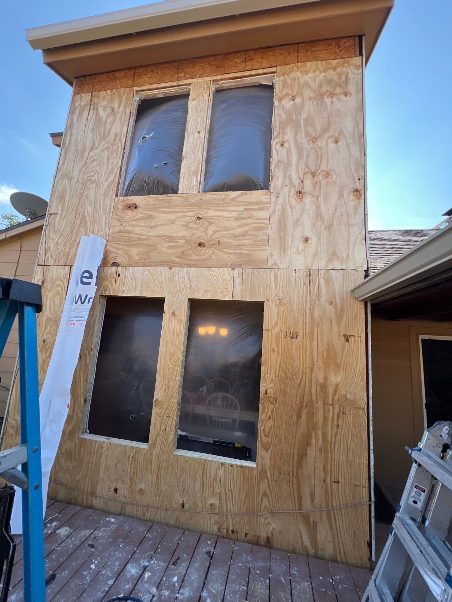 Installing Windows on a Submarine  by Bayfront Roofing and Construction