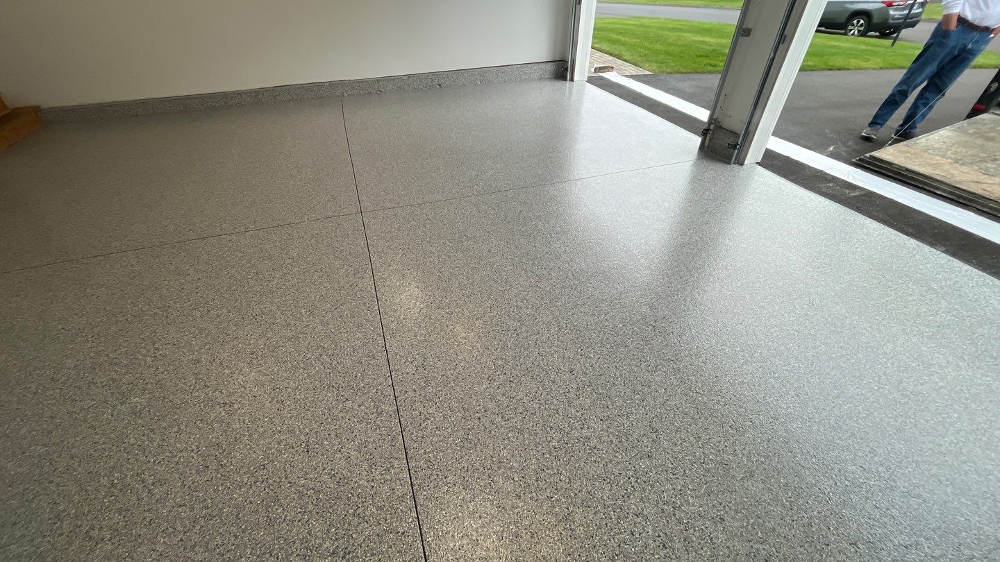 Garage in Londonderry, NH 03053 by Symphony Concrete Coatings
