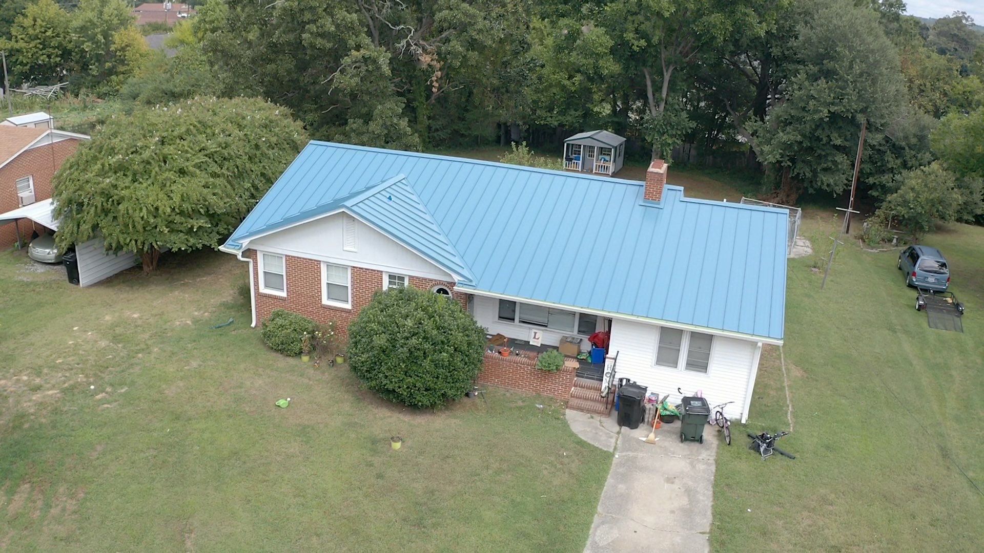 Carolina Blue Standing Seam Roof by Just In Time Roofing and Restoration