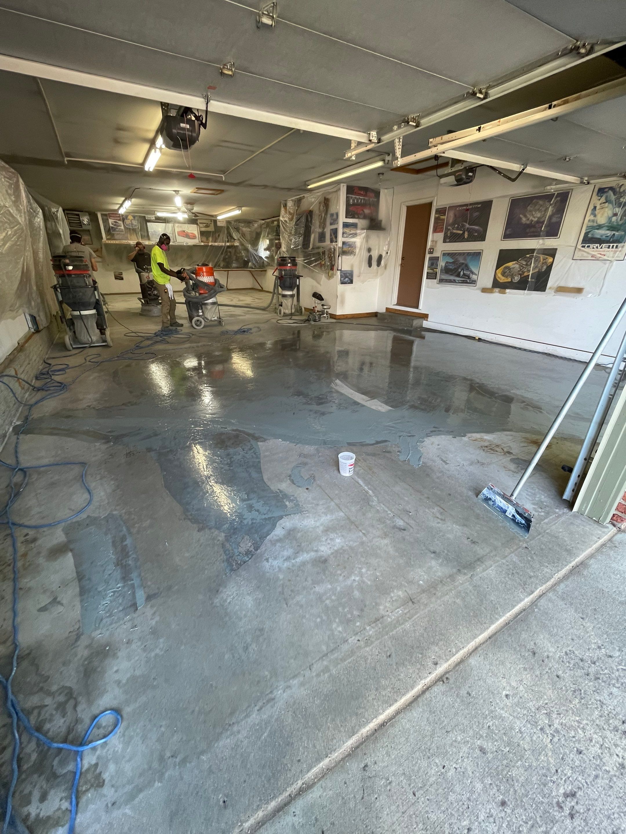 High-Performance Polyurea Garage Floor Coating and Stem Wall Finishing in Sioux Falls by Select Painting, Coatings & Garage Cabinets