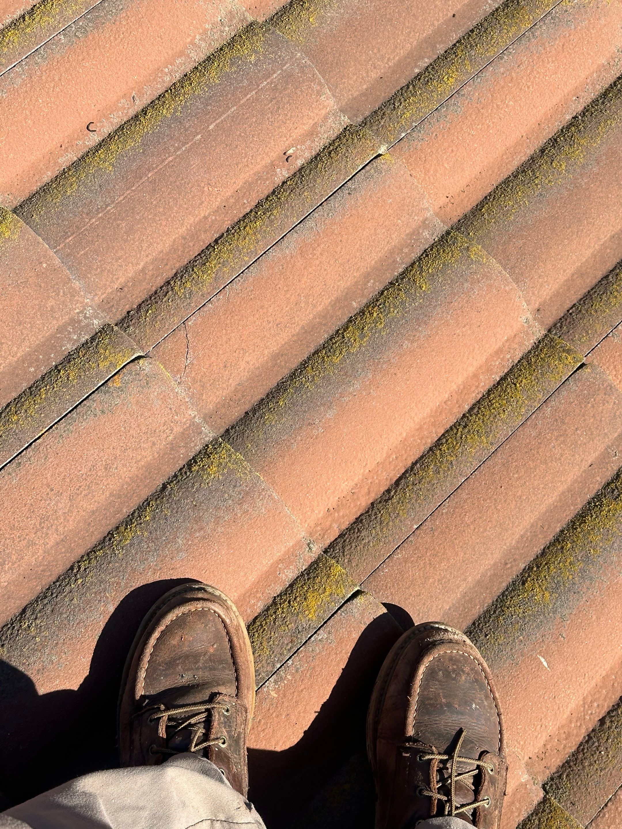 Tile Roof repair by Grandmark Service Company