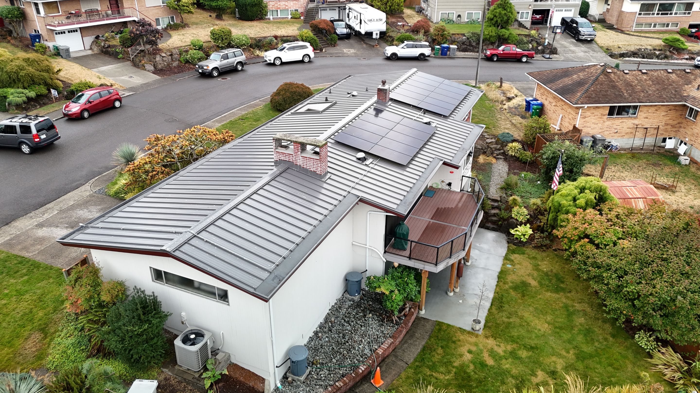 Low Slope Shingles to Metal with Built in Gutters by RoofSmart