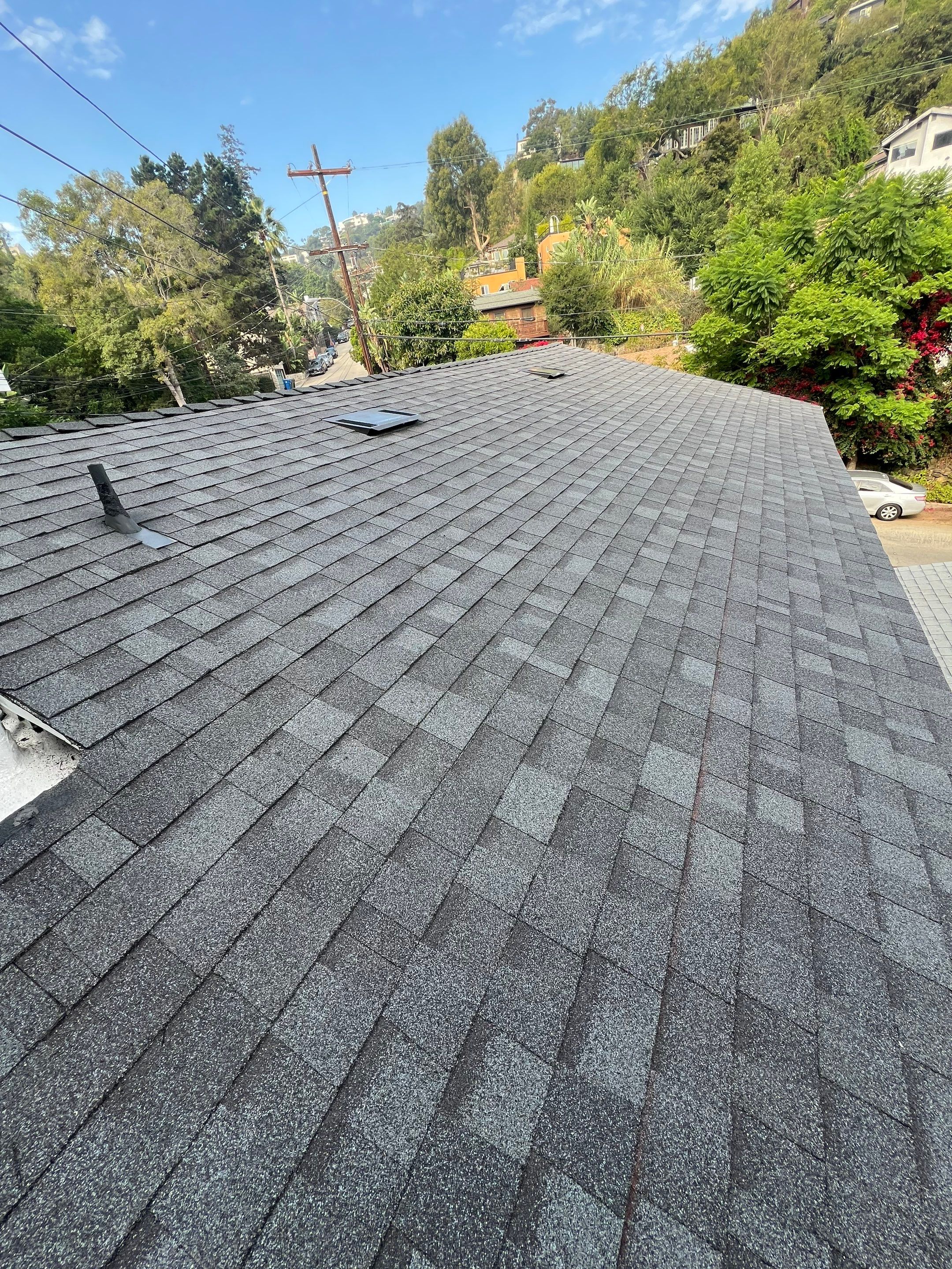 Residential Roofing Installation using Shingles and Silicone by Hull Brothers Roofing