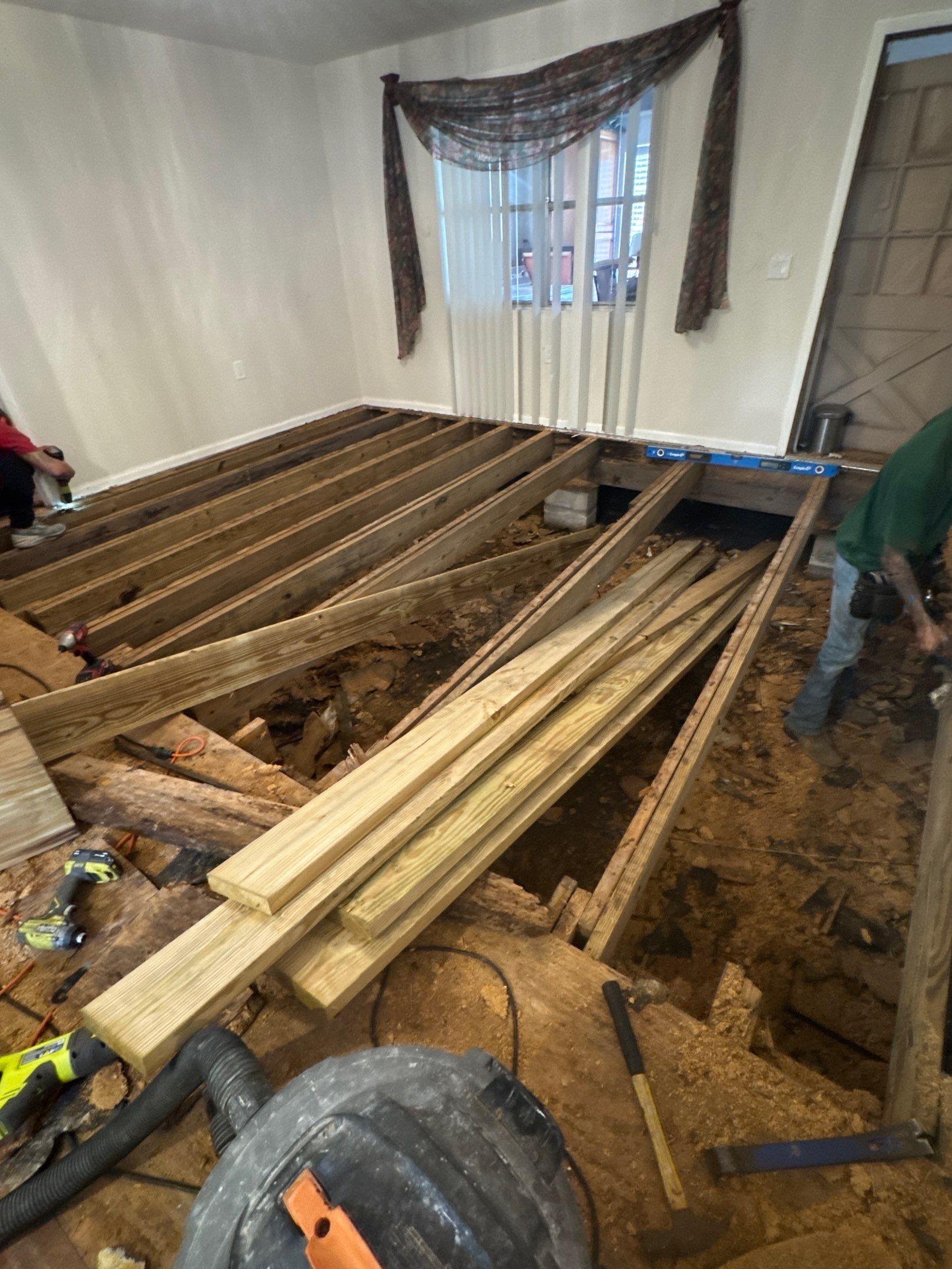 Subfloor Repairs & Flooring Installation by Axtra Hand