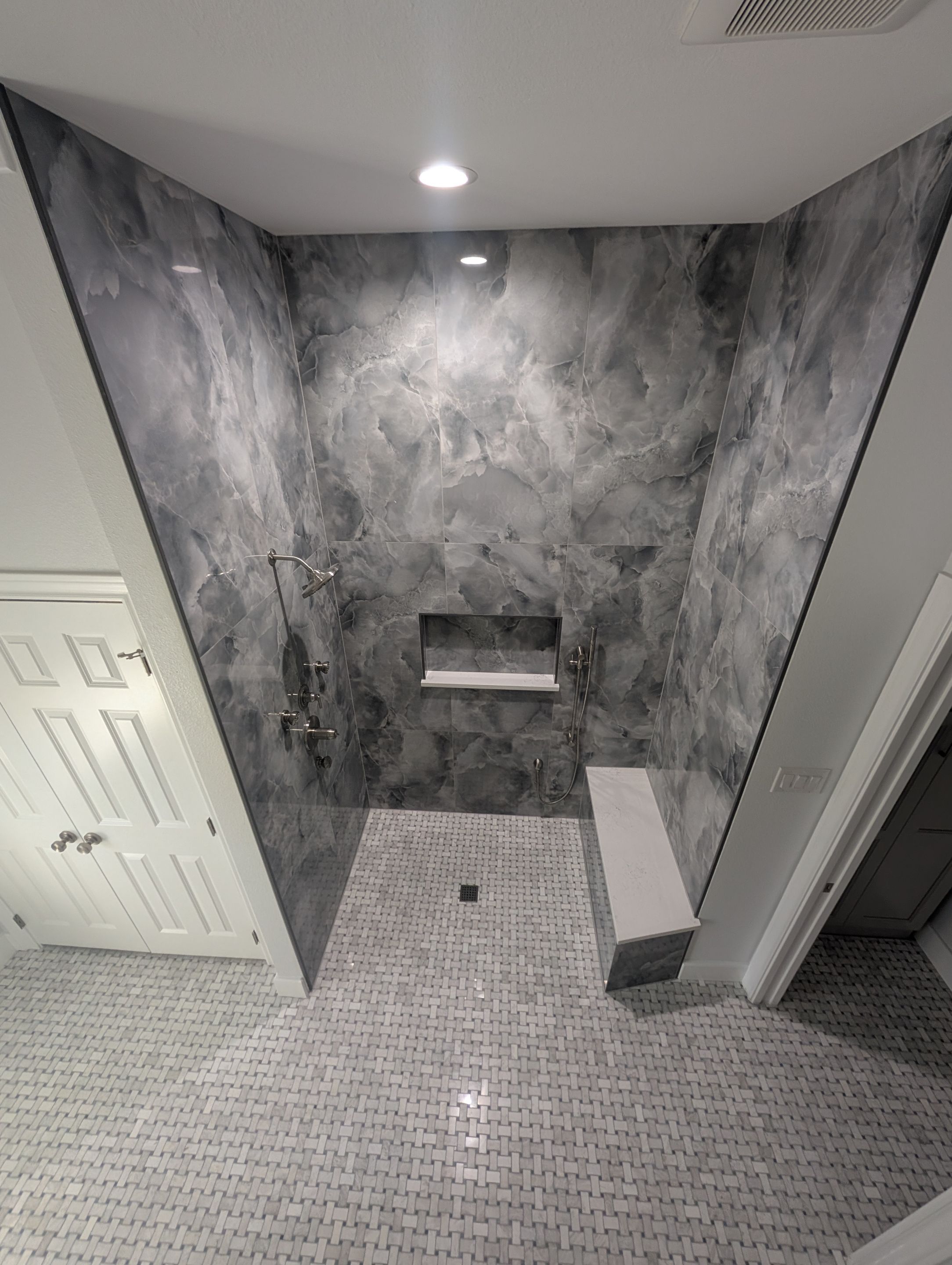 Walker Ranch Bathroom Remodel with Expanded Walk-In Shower and Custom Storage by Legacy Bath and Kitchen