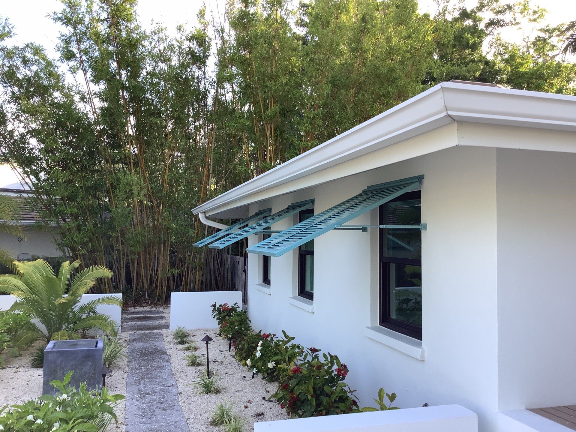 White Seamless Gutters and Downspouts in Sarasota FL by Gutter Professors