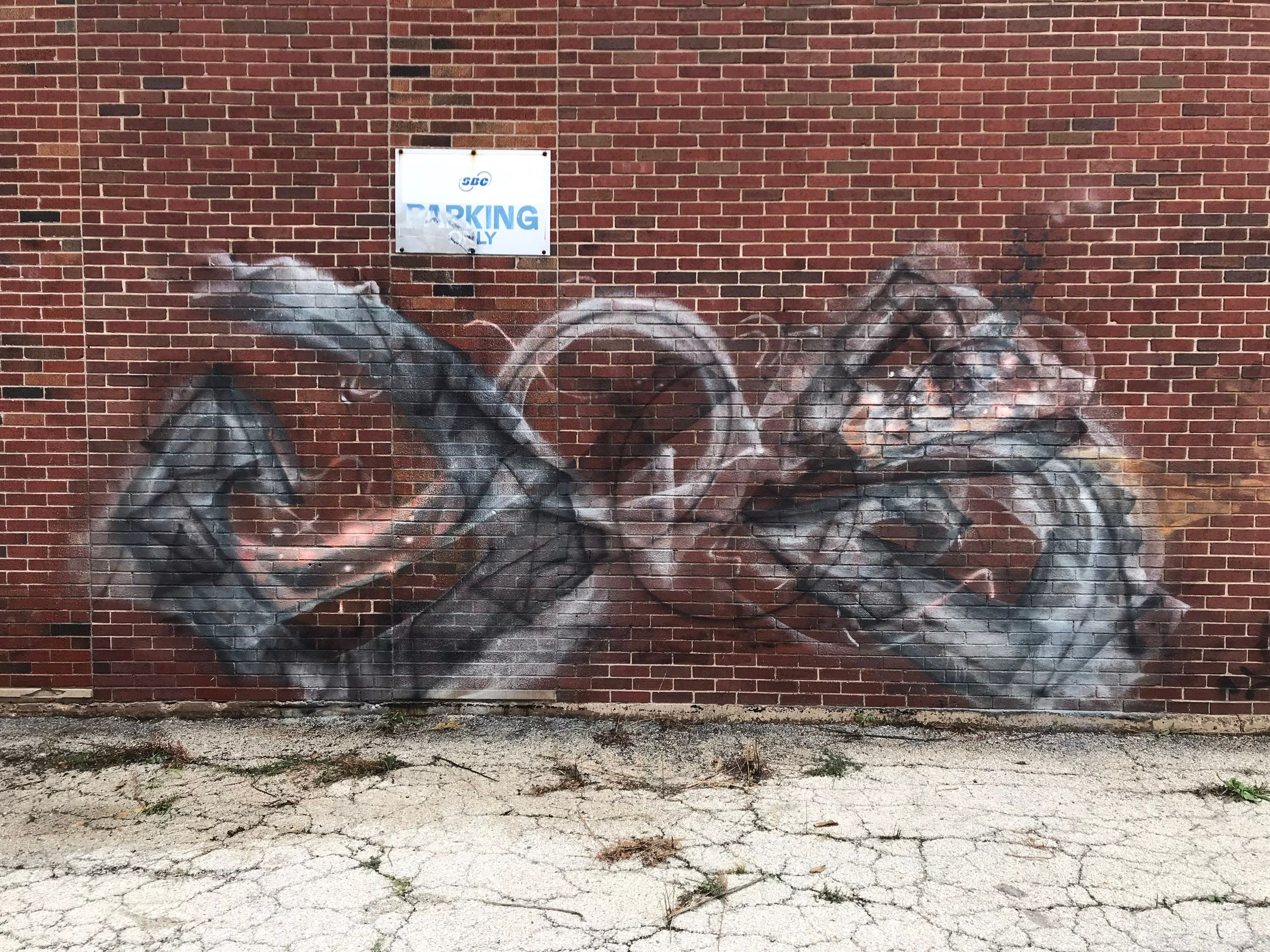 Graffiti removal  using Graffiti remover by Northern Power Washing LLC.