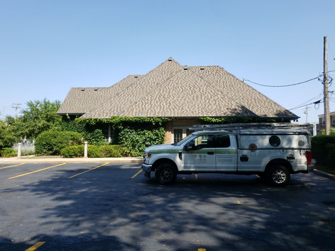 Asphalt Roof Replacement and Aluminum Gutter Installment  by Custom Installations, Inc.