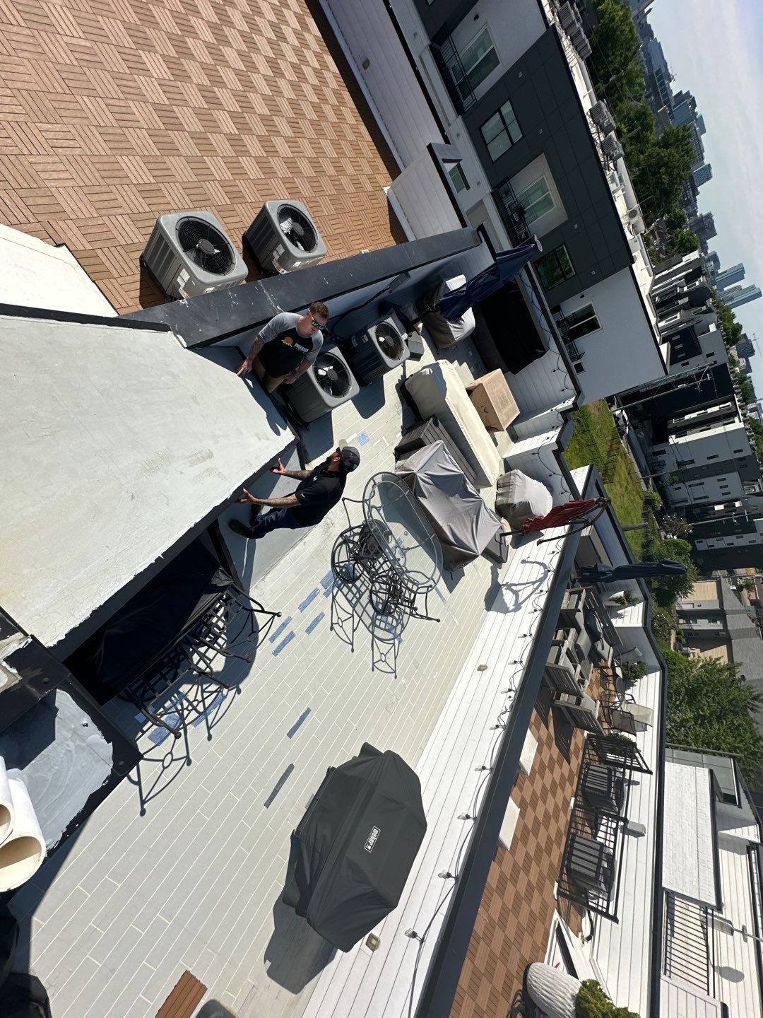 TPO Roofing System with Roof Deck Pavers by Undersun Roofing 