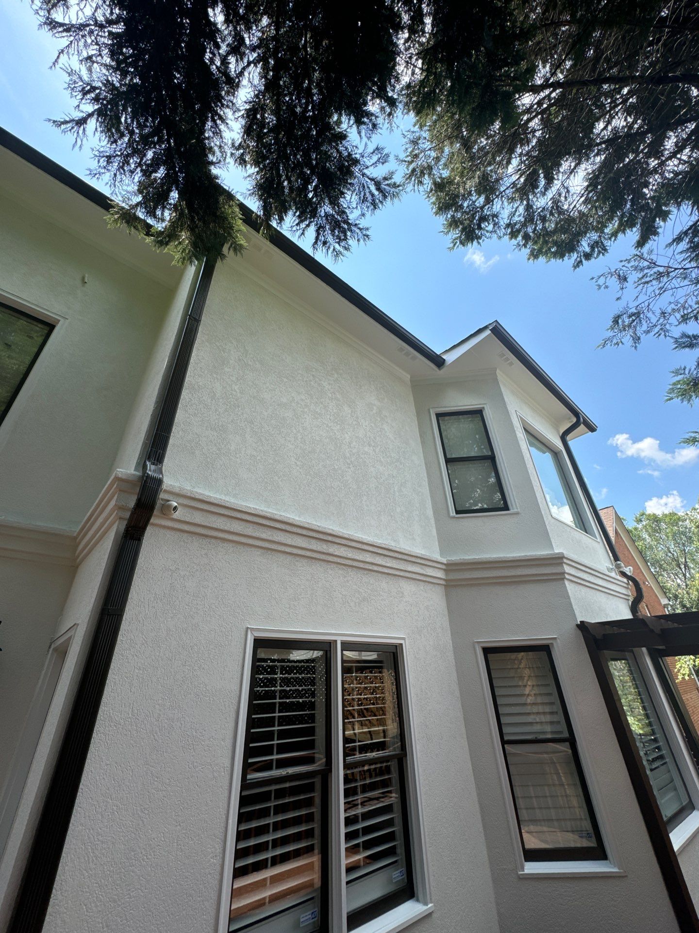 Full Exterior Stucco Painting and Wood Deck Staining in Atlanta by Swift Home Renovations