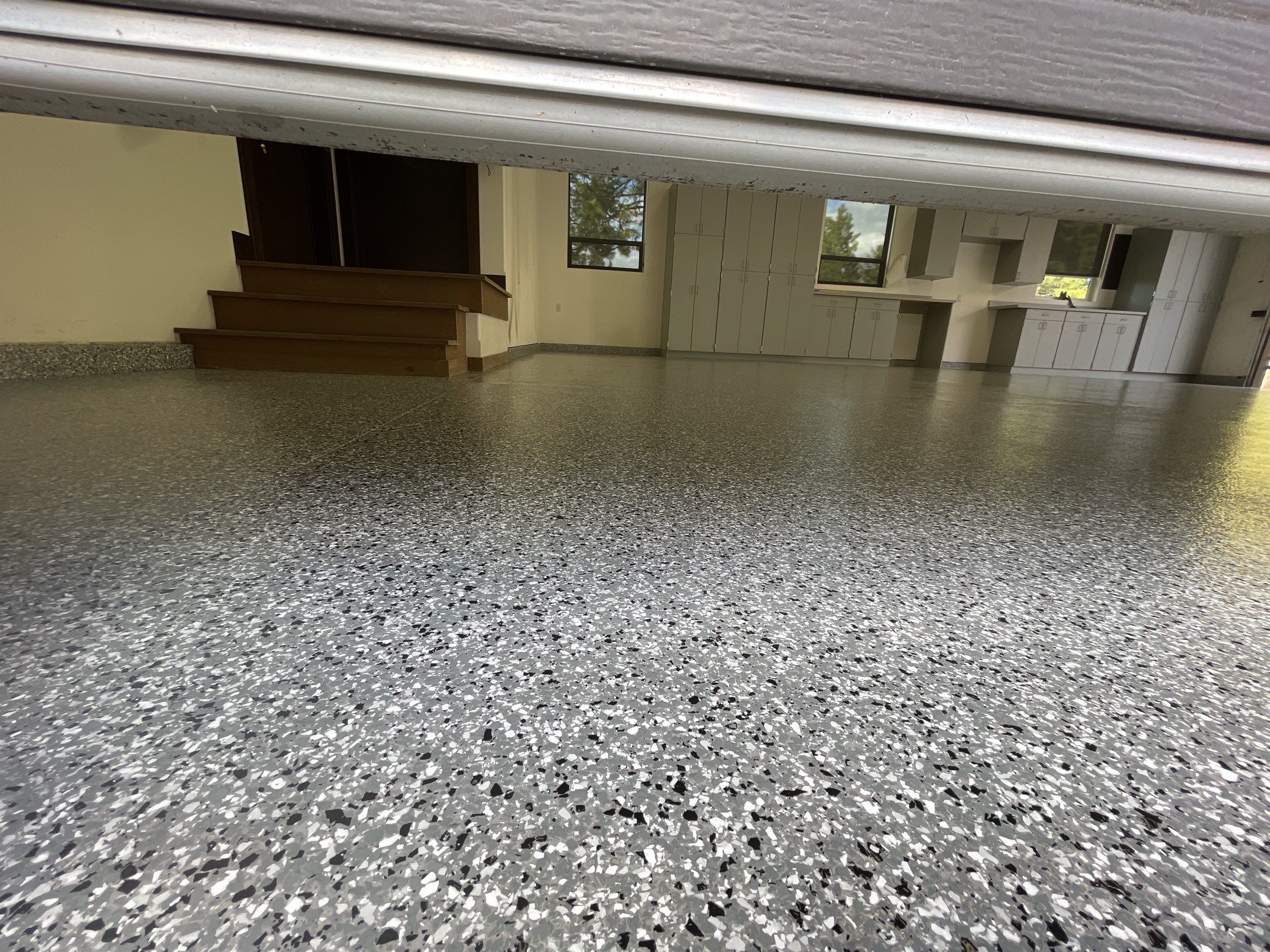 Garage Transformation using Smoke and the Penntek Evolution System by Croc Coatings, LLC