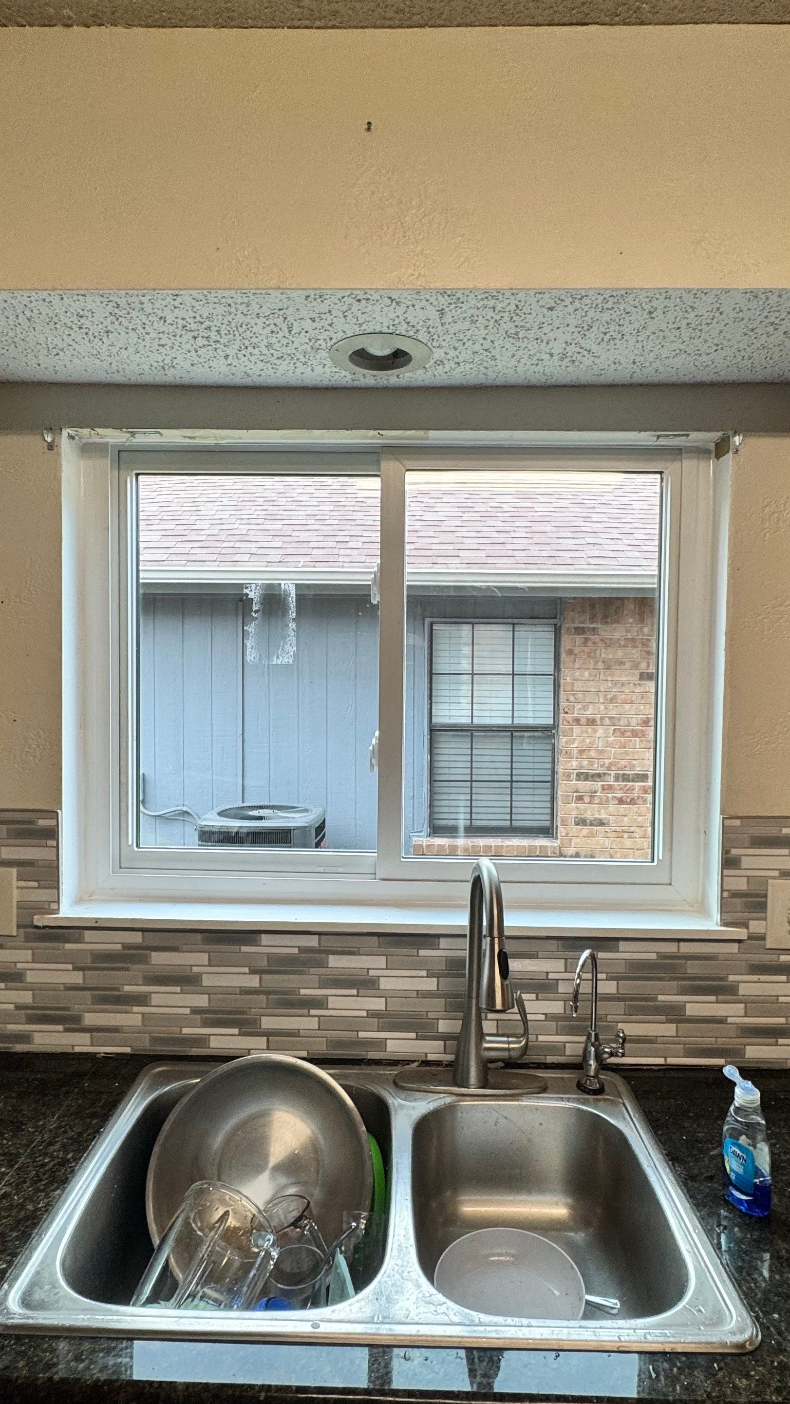 Windows and Exterior Paint by Rhino Roofing and General Contracting, LLC