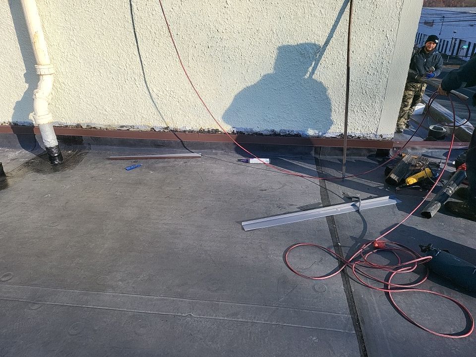 Commercial Roofing Installation using EPDM  by A Plus Exterior