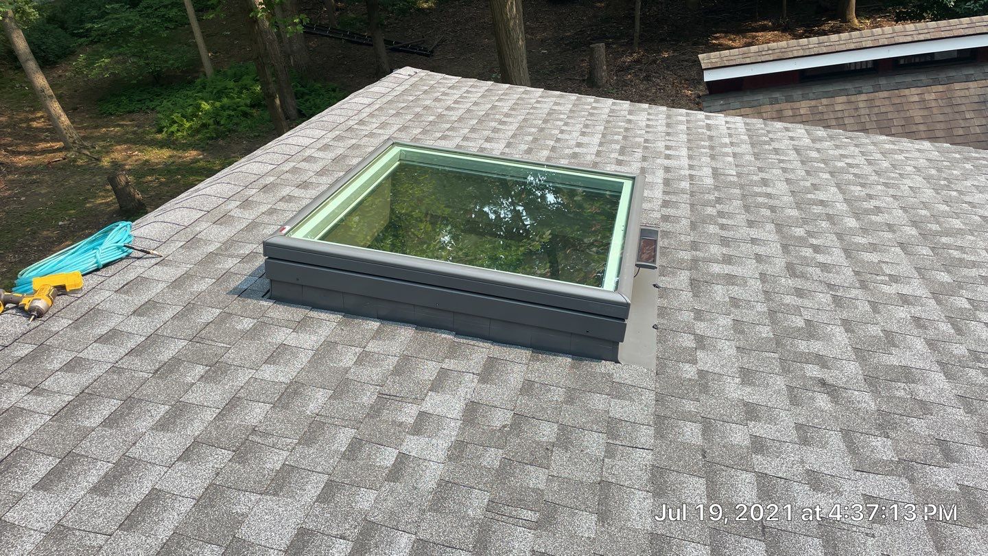 Deckhouse Roof Replacement by American Home Contractors