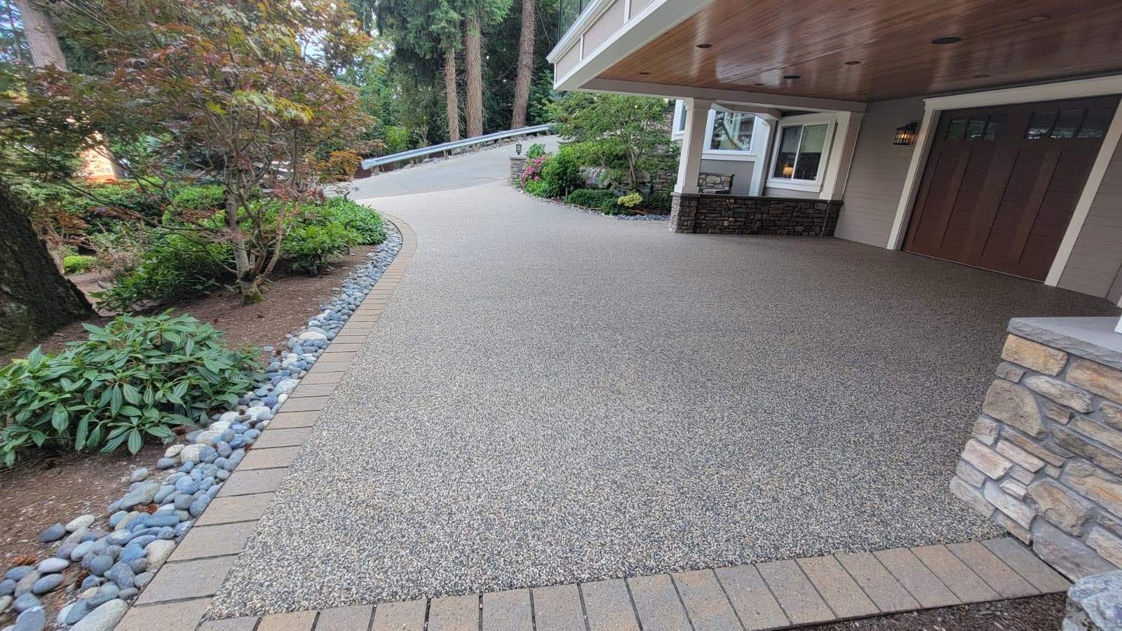 Coastal Grandeur Driveway and Patio in Big Sur Vuba Stone by Concrete Coating Experts Inc.