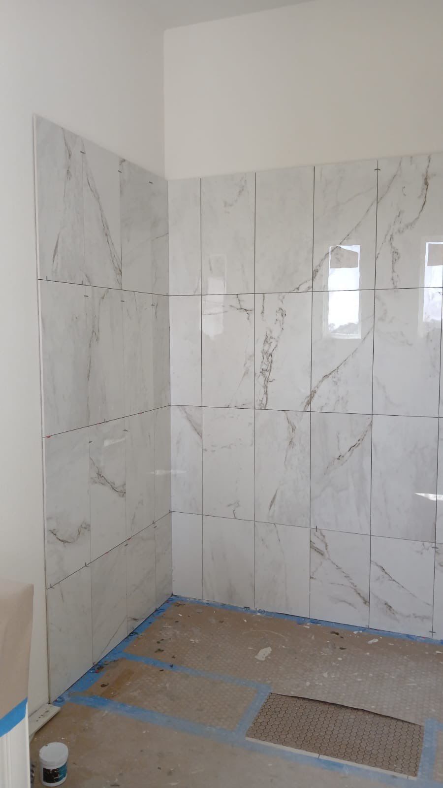 Kitchen and Bathroom Remodel Featuring Custom Stone and Tile in Mico by Mena stone surfaces