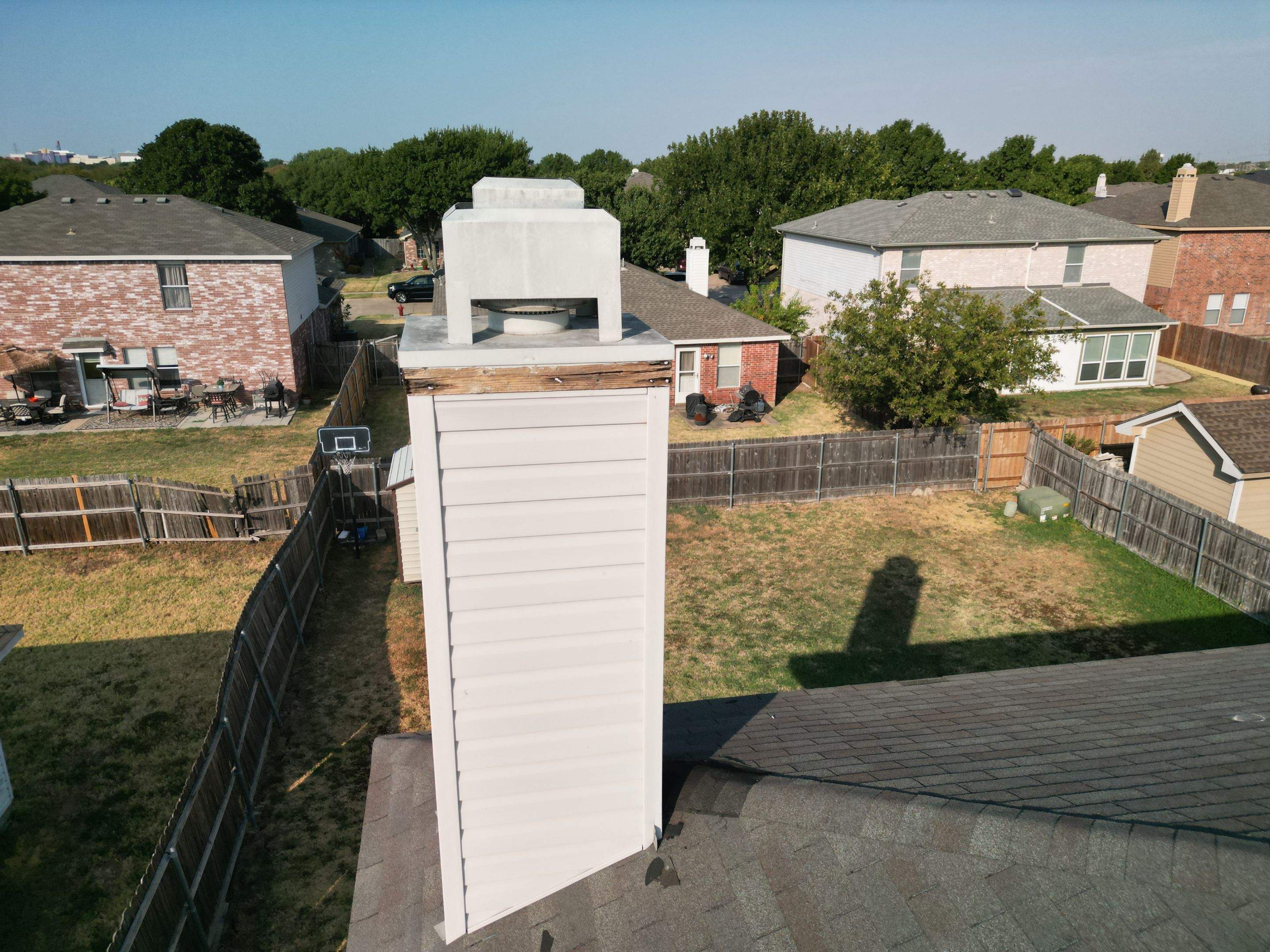 Full Roof Replacement, Chimney Rebuild and Interior Damage Replacement by First United Roofing & Construction