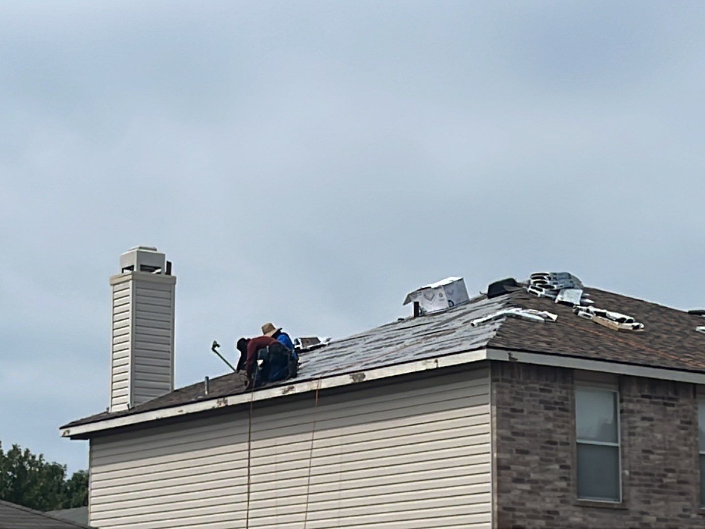Full Roof Replacement, Chimney Rebuild and Interior Damage Replacement by First United Roofing & Construction